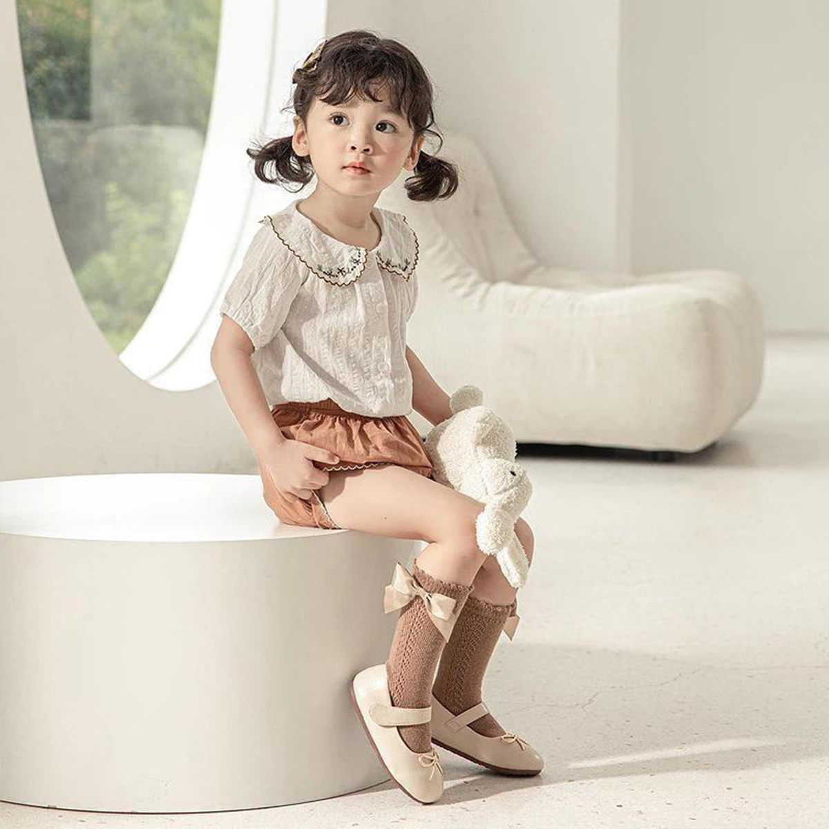 Tất nơ cao cổ bé gái