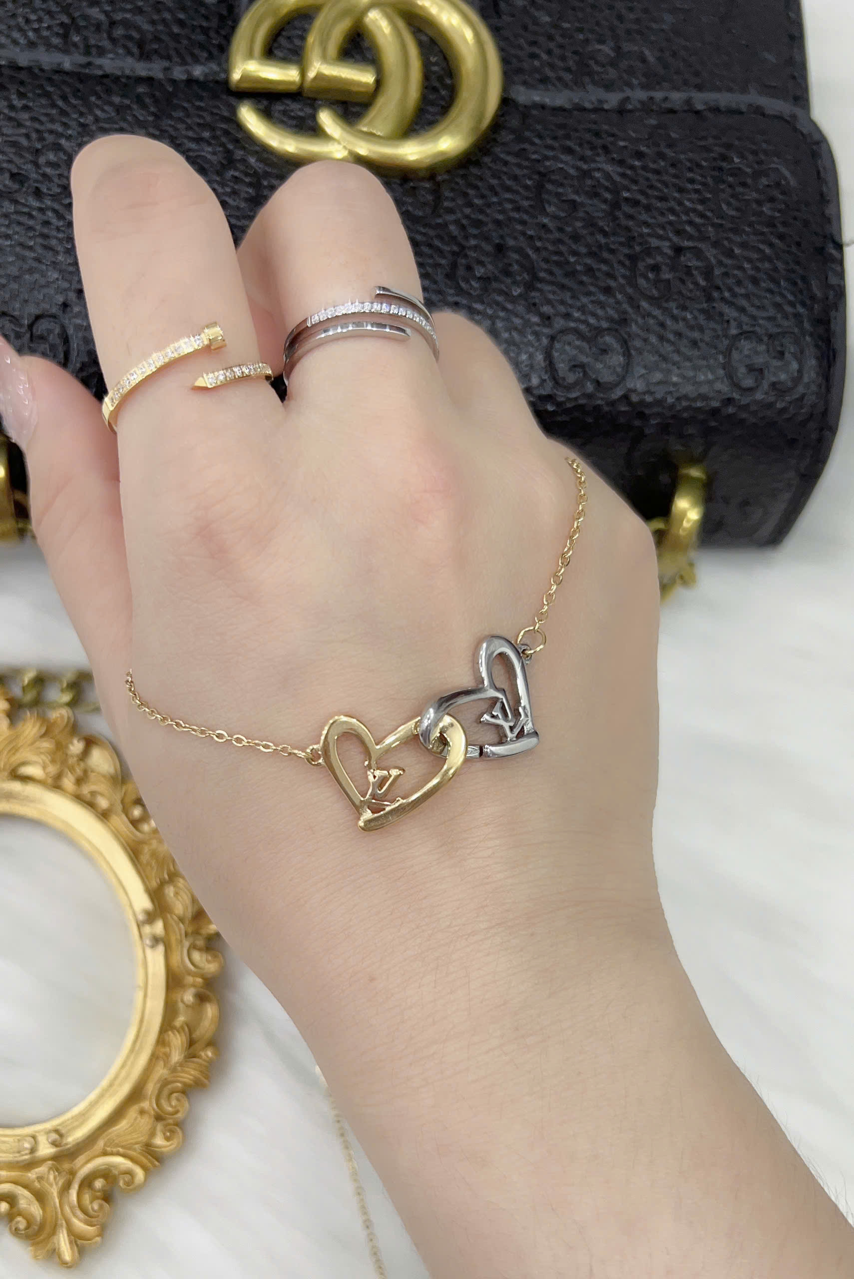 Dây chuyền Titan - TM043 - Trái tim LV cách điệu