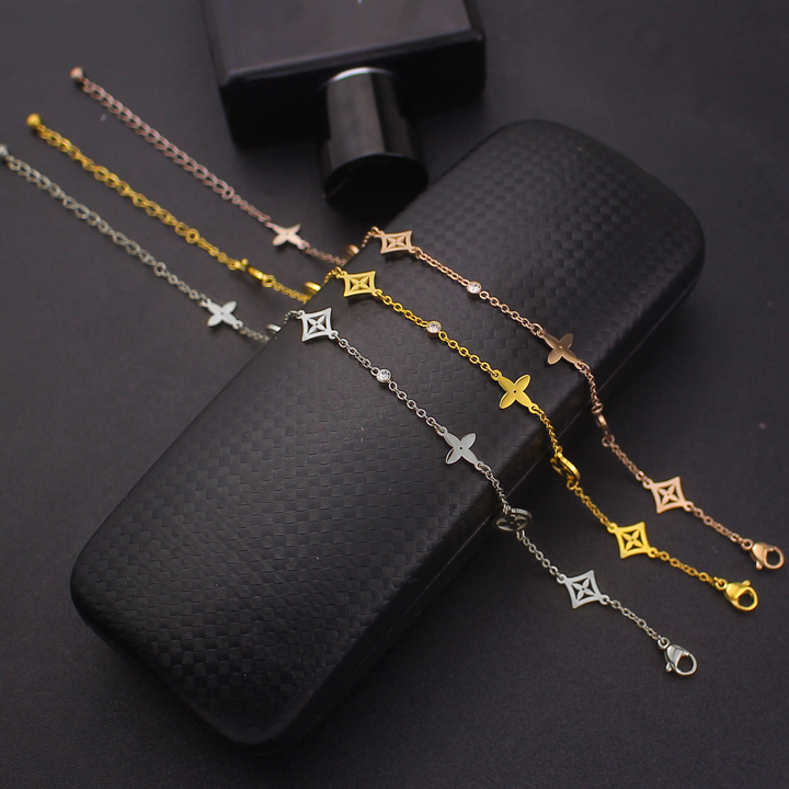 Lắc chân Titan - TA649 - thời trang LV