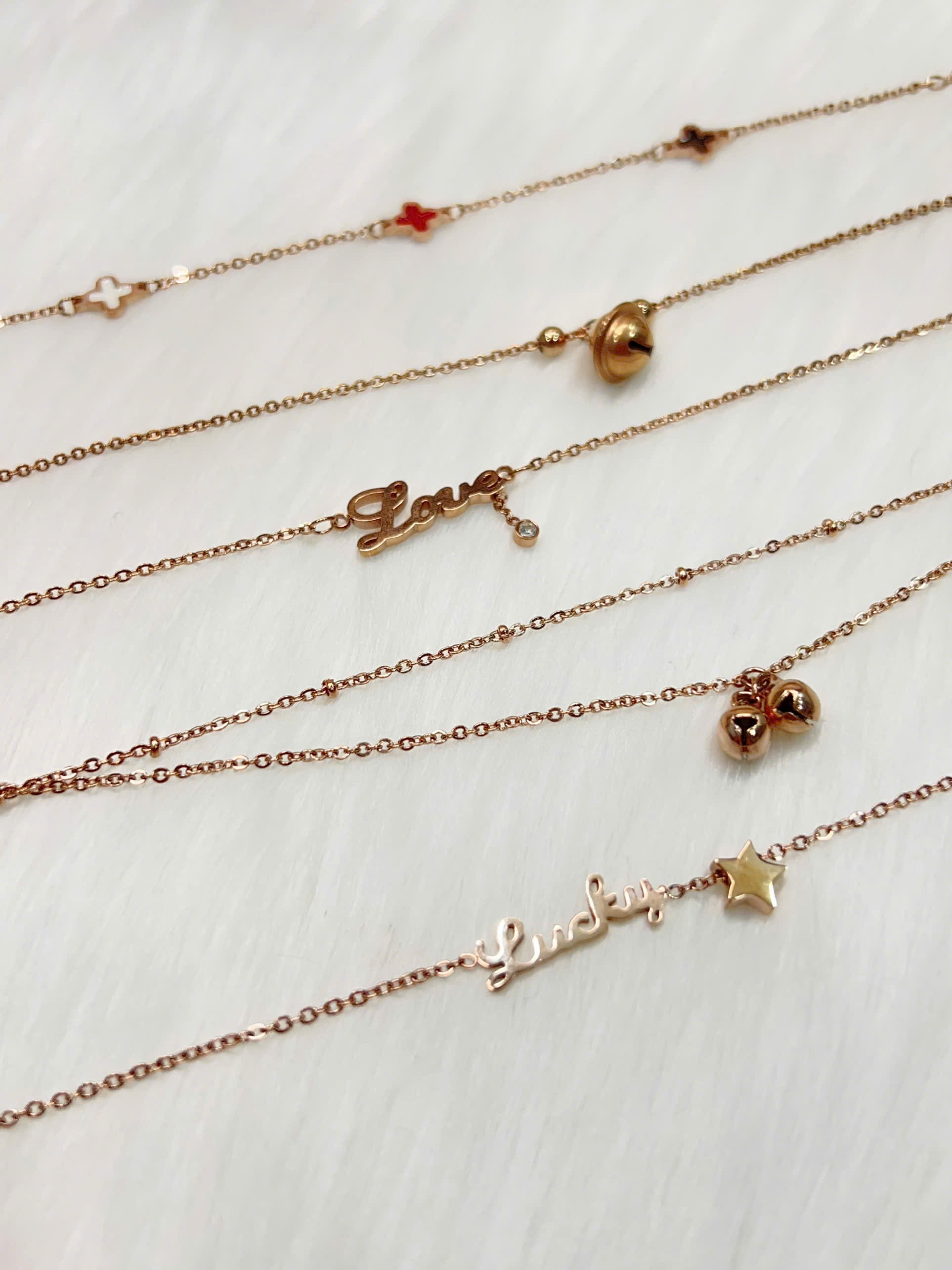 Lắc chân Titan - BST nhiều kiểu dáng màu vàng hồng