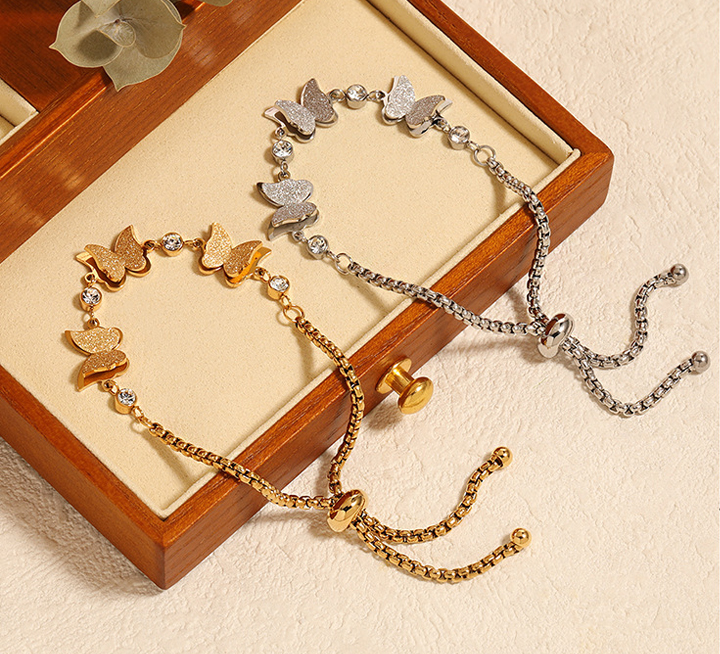 Lắc tay Titan - TA089 - con bướm dây rút