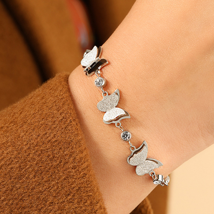 Lắc tay Titan - TA089 - con bướm dây rút