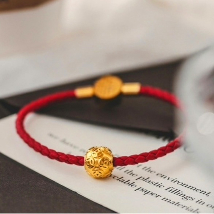 Vòng tay titan - TV138 - dây đỏ kim tiền may mắn