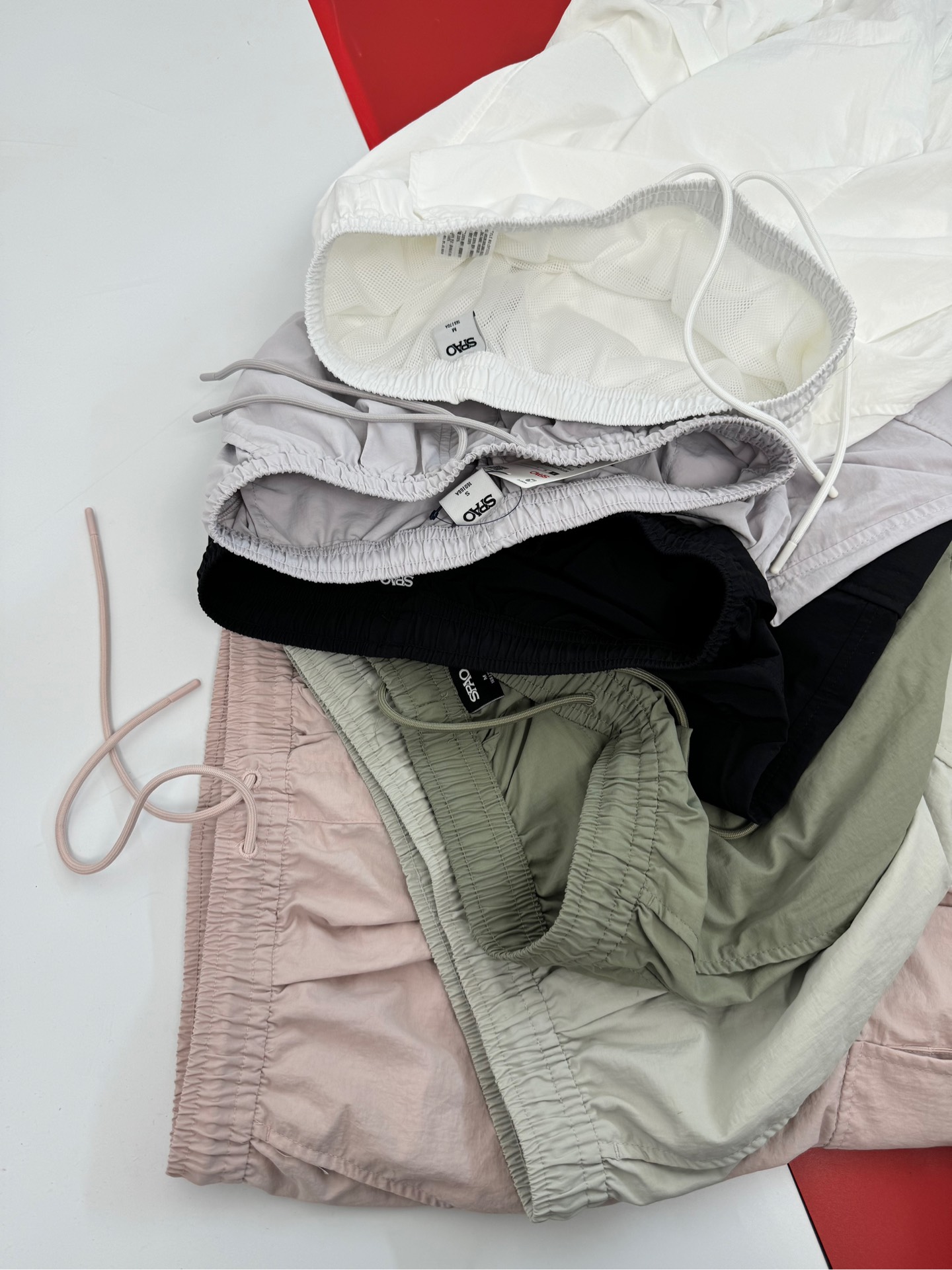 Q36 Quần gió nữ ống rộng Spao
