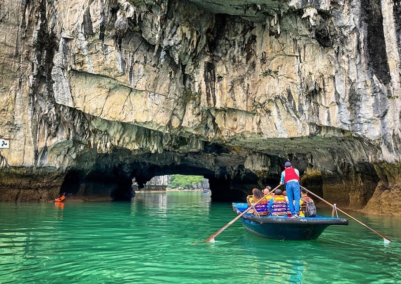 Kayaking through hidden water tunnel Lan Ha Bay