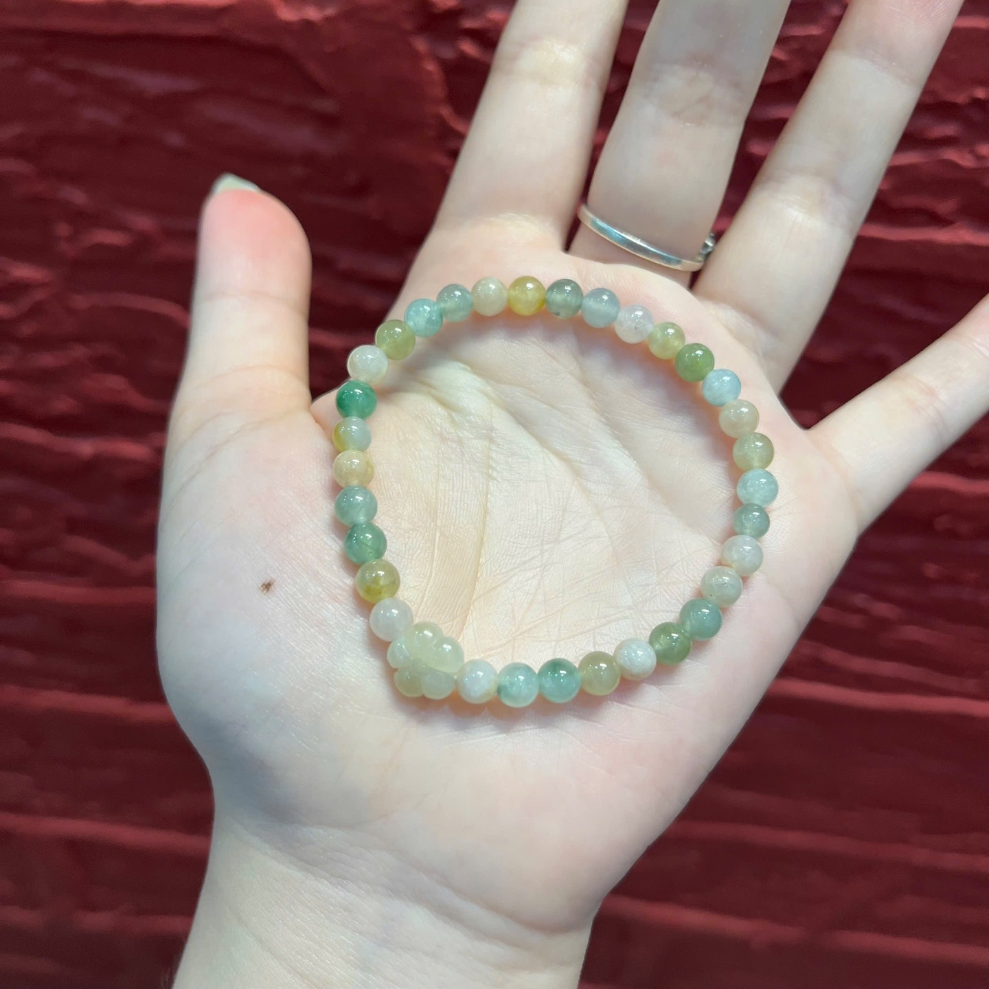 Vòng phỉ thuý đa bảo tông Pastel mix charm hoa mai