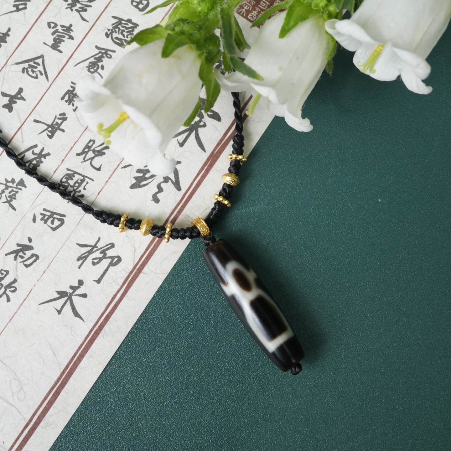 Vòng cổ Dzi thần tài thân dầu- CTKM