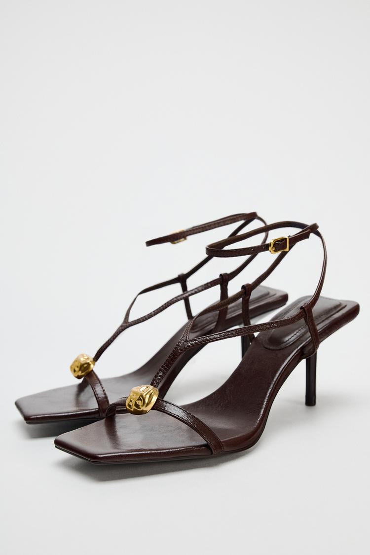 LEATHER HEEL SANDALS WITH STRAPS AND EMBELLISHMENT