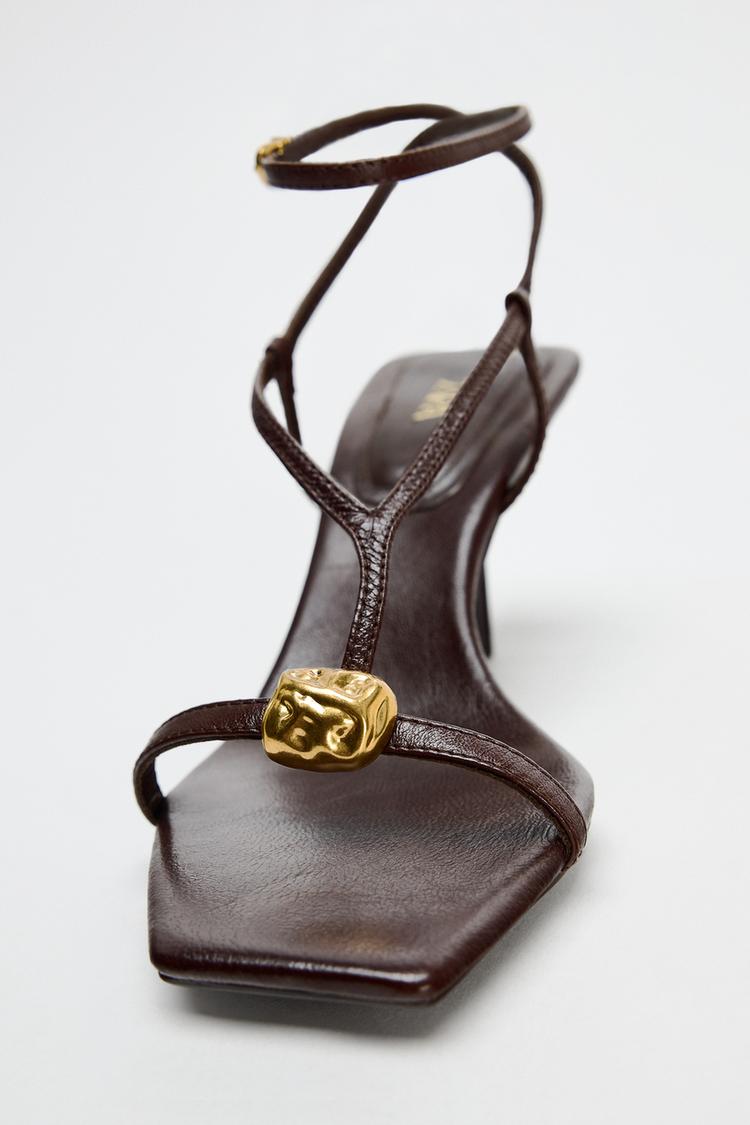 LEATHER HEEL SANDALS WITH STRAPS AND EMBELLISHMENT