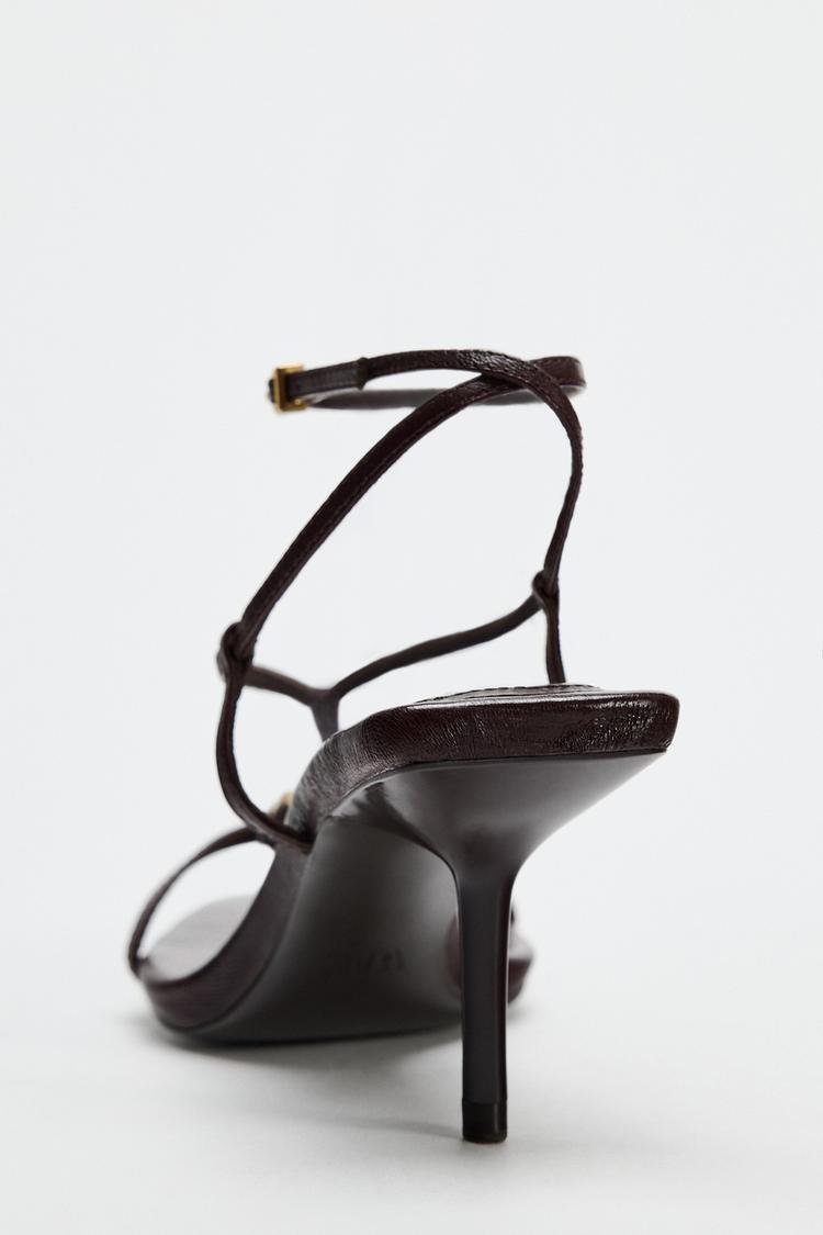 LEATHER HEEL SANDALS WITH STRAPS AND EMBELLISHMENT