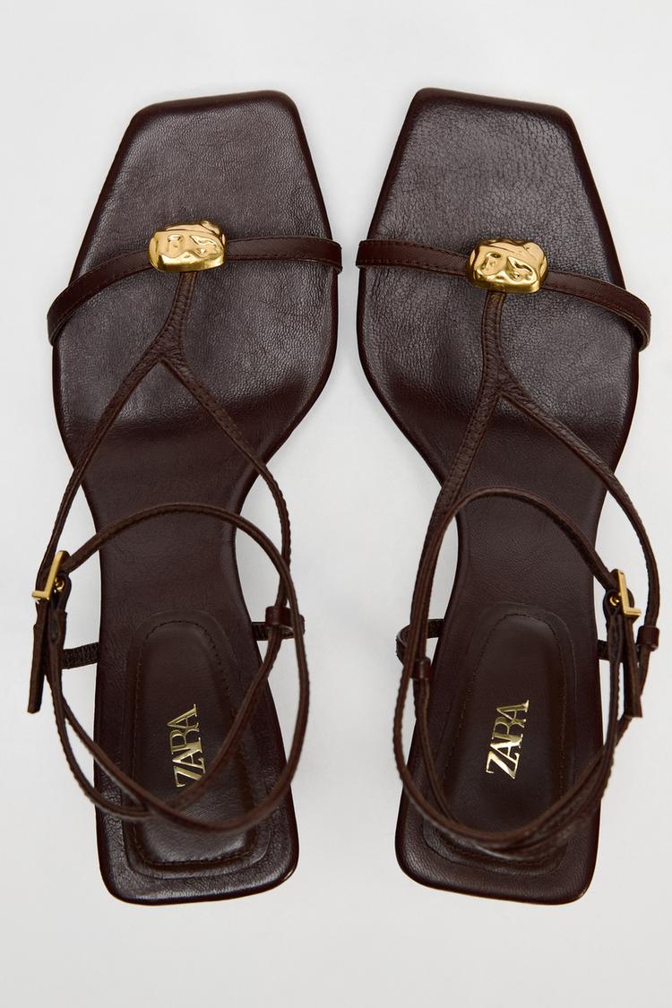 LEATHER HEEL SANDALS WITH STRAPS AND EMBELLISHMENT