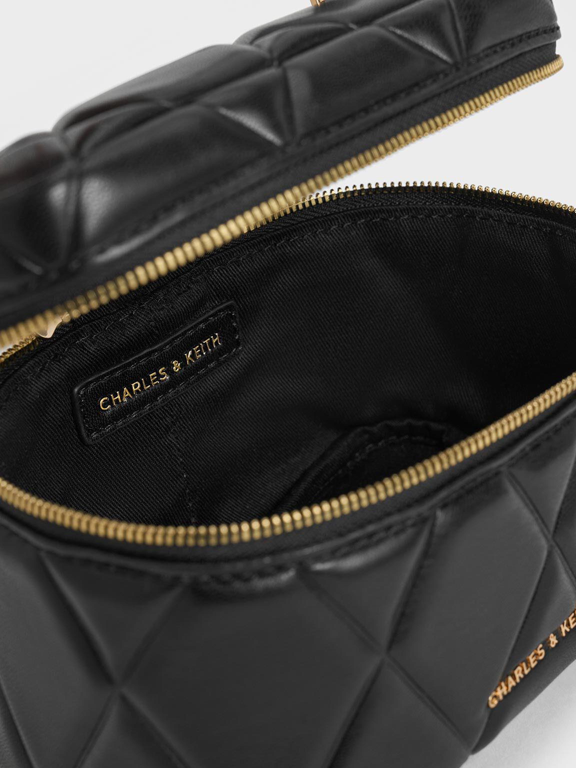 Arwen Quilted Top Handle Vanity Bag