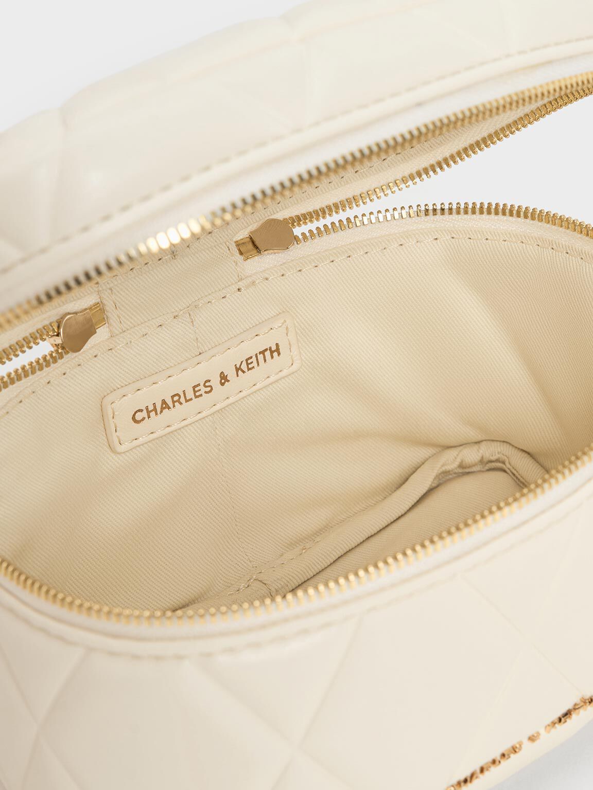 Arwen Quilted Top Handle Vanity Bag