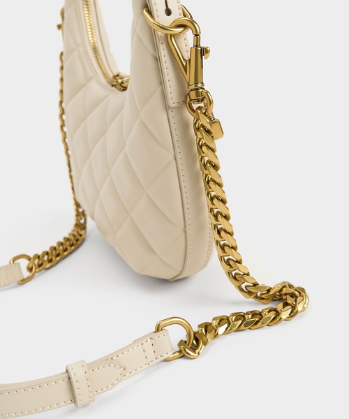 CNK Swing Padlock Quilted Crescent Bag