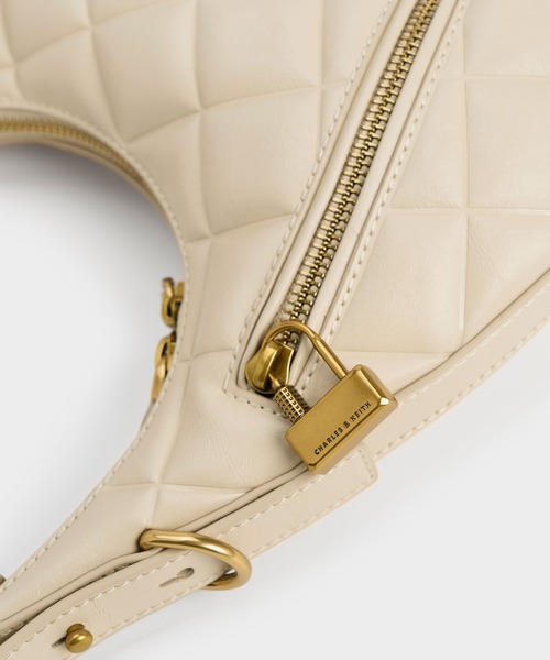 CNK Swing Padlock Quilted Crescent Bag