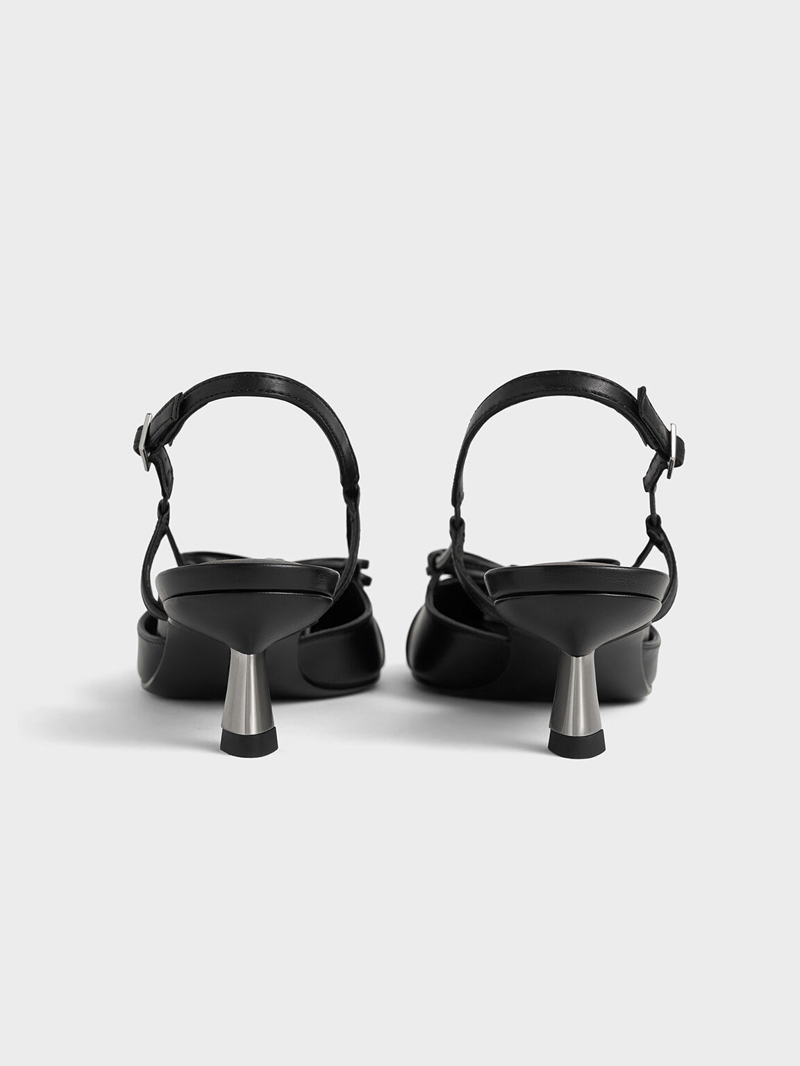 Patent Cap-Toe Bow Slingback Pumps