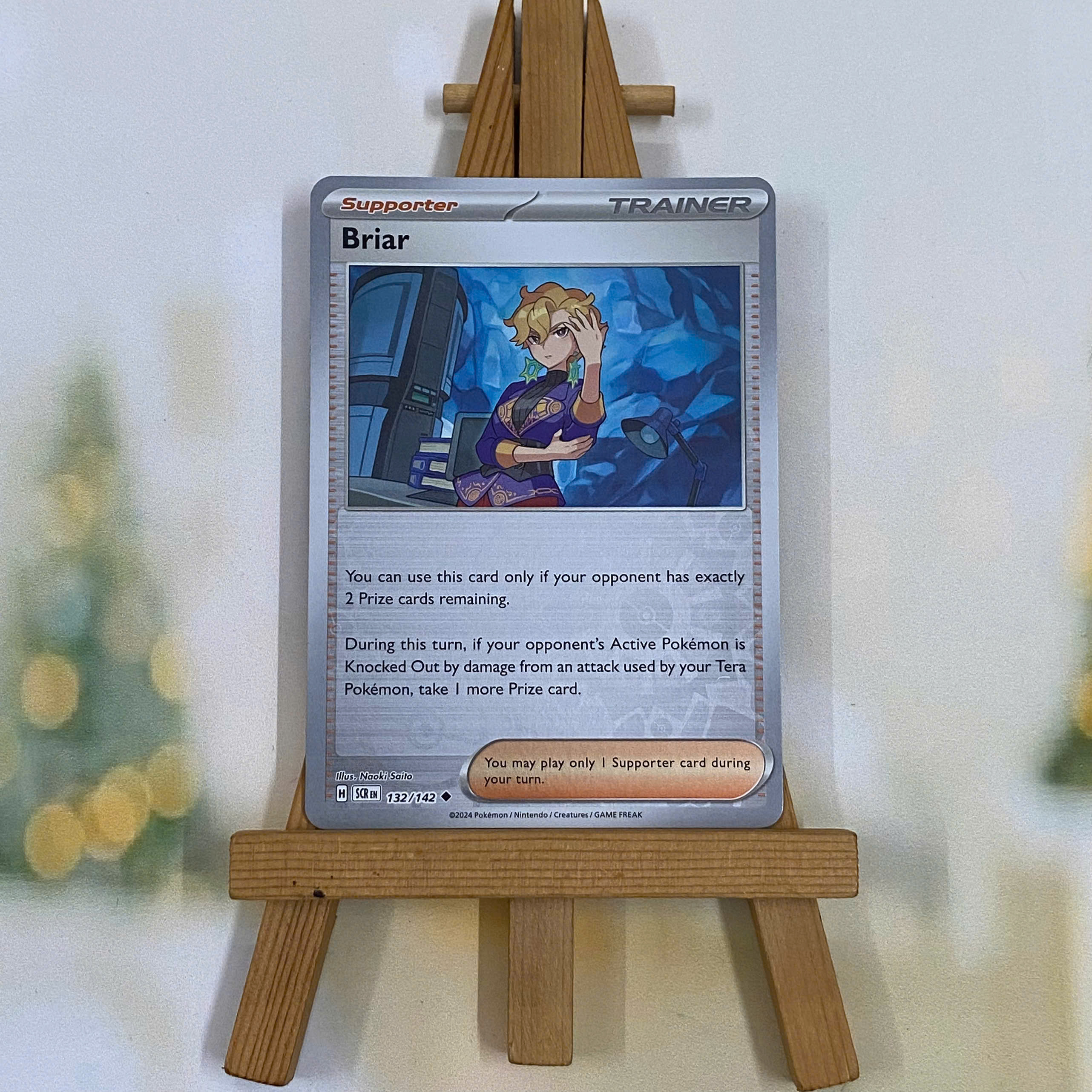 Thẻ hình Pokemon Briar 132/142 - Lá bài lẻ Stellar Crown Uncommon Reverse Holo tiếng Anh chính hãng