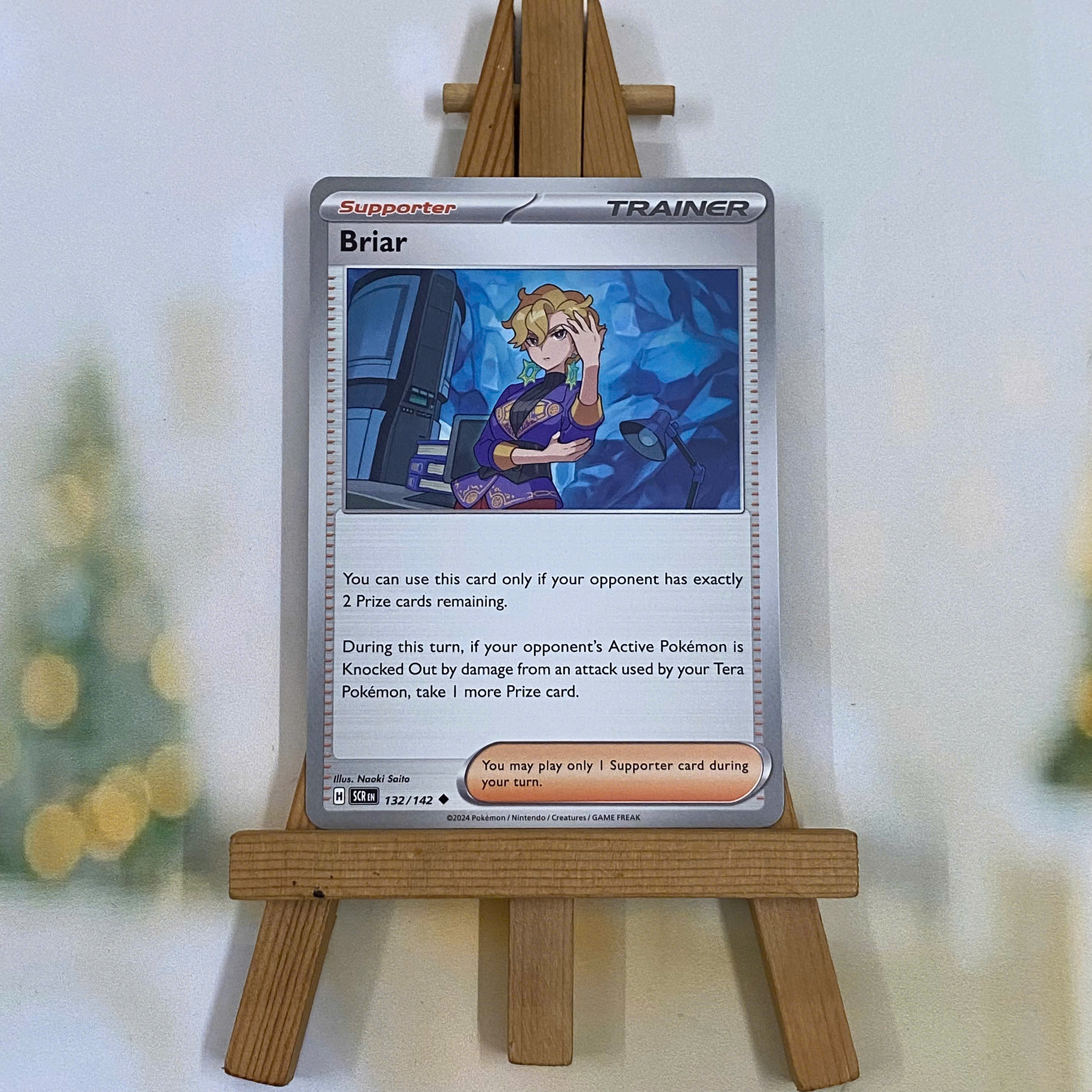 Thẻ hình Pokemon Briar 132/142 - Lá bài lẻ Stellar Crown Uncommon Reverse Holo tiếng Anh chính hãng