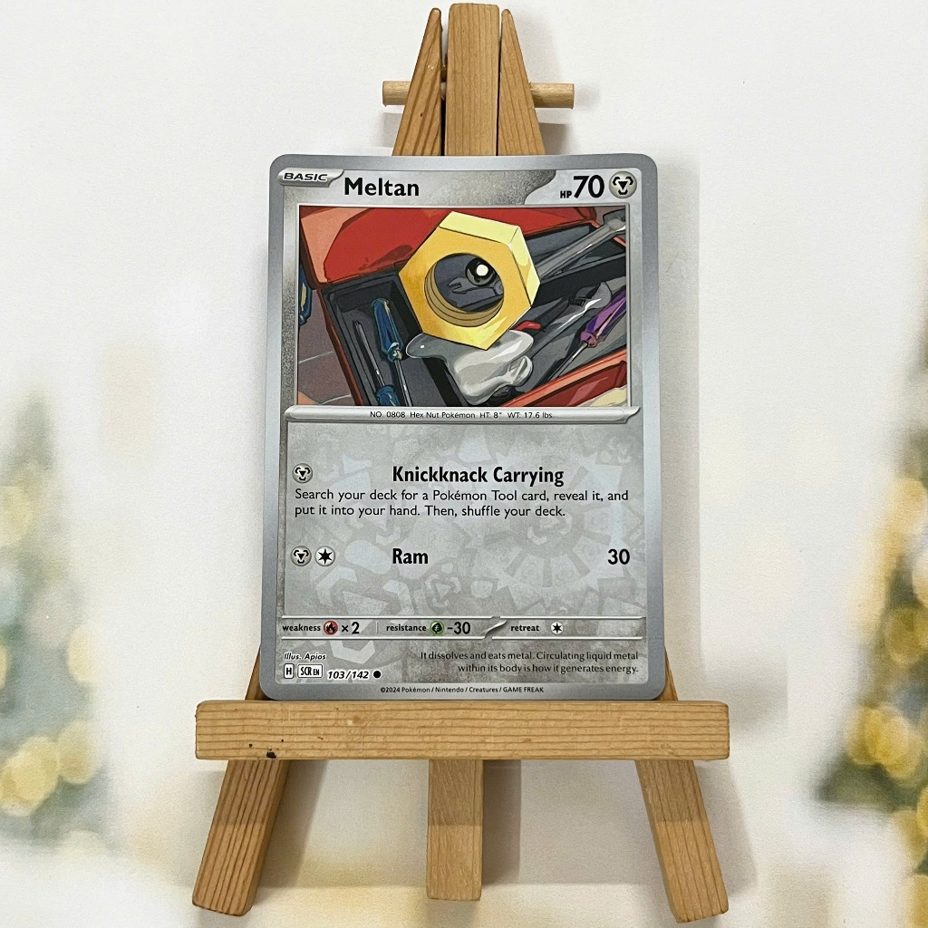 Thẻ hình Pokemon Meltan 103/142 - Lá bài lẻ Stellar Crown Common Reverse Holo tiếng Anh chính hãng