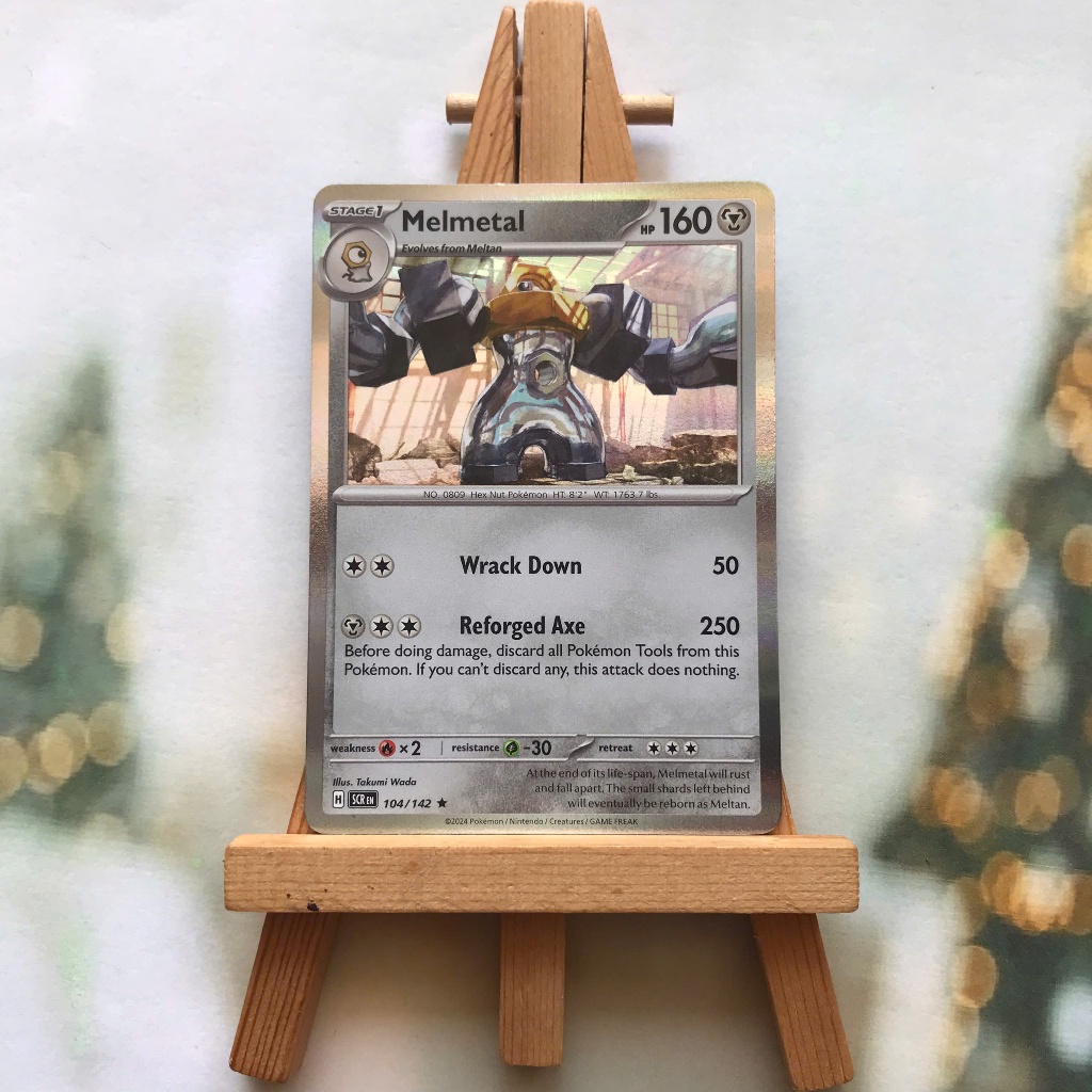 Thẻ hình Pokemon Melmetal 104/142 - Lá bài lẻ Stellar Crown Reverse Holo Rare tiếng Anh chính hãng