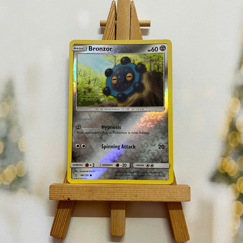 Thẻ hình Pokemon Bronzor 86/156 - Lá bài lẻ Sun & Moon Ultra Prism Common Reverse Holo tiếng Anh chính hãng