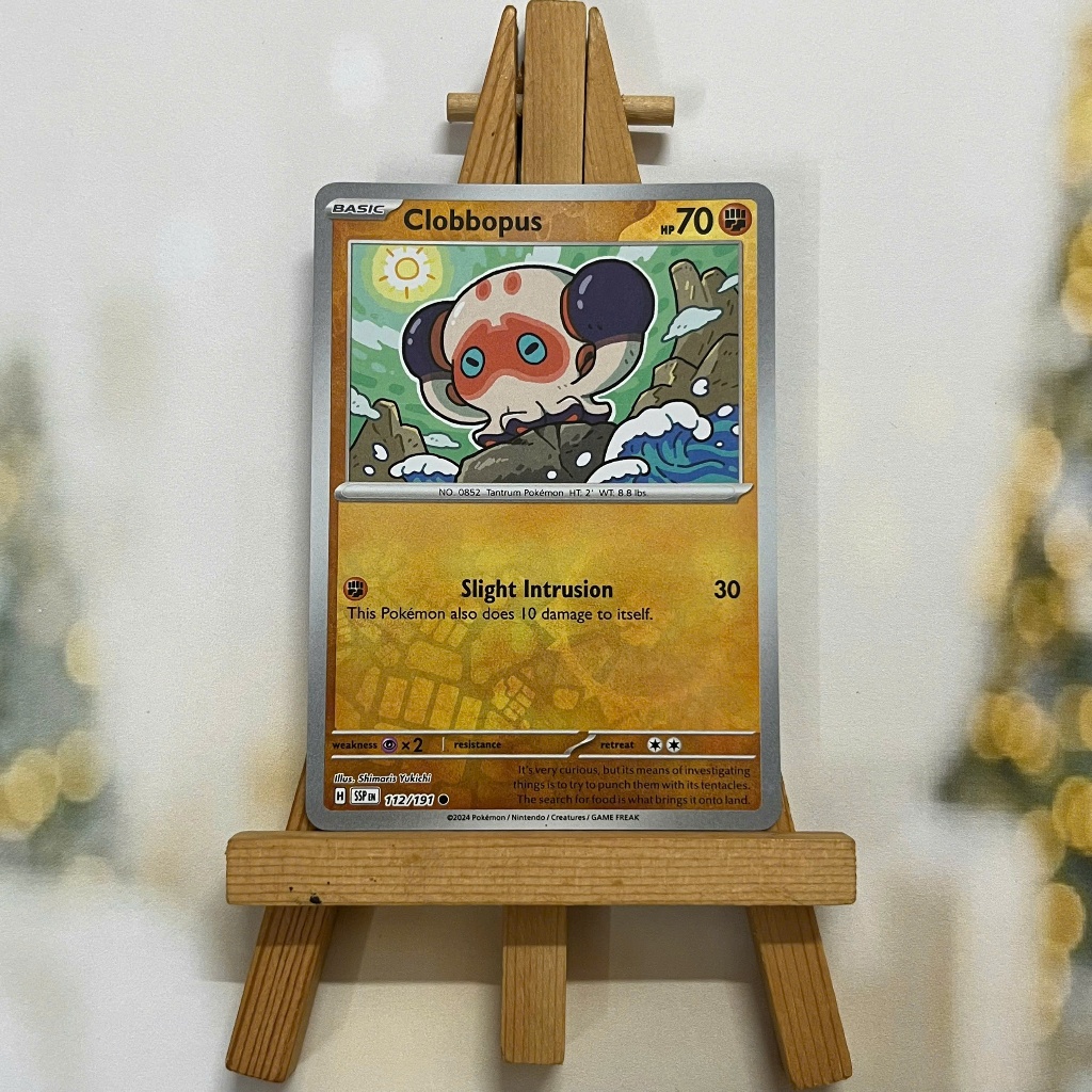 Thẻ hình Pokemon Clobbopus 112/191 - Lá bài lẻ Surging Sparks Common Reverse Holo tiếng Anh chính hãng