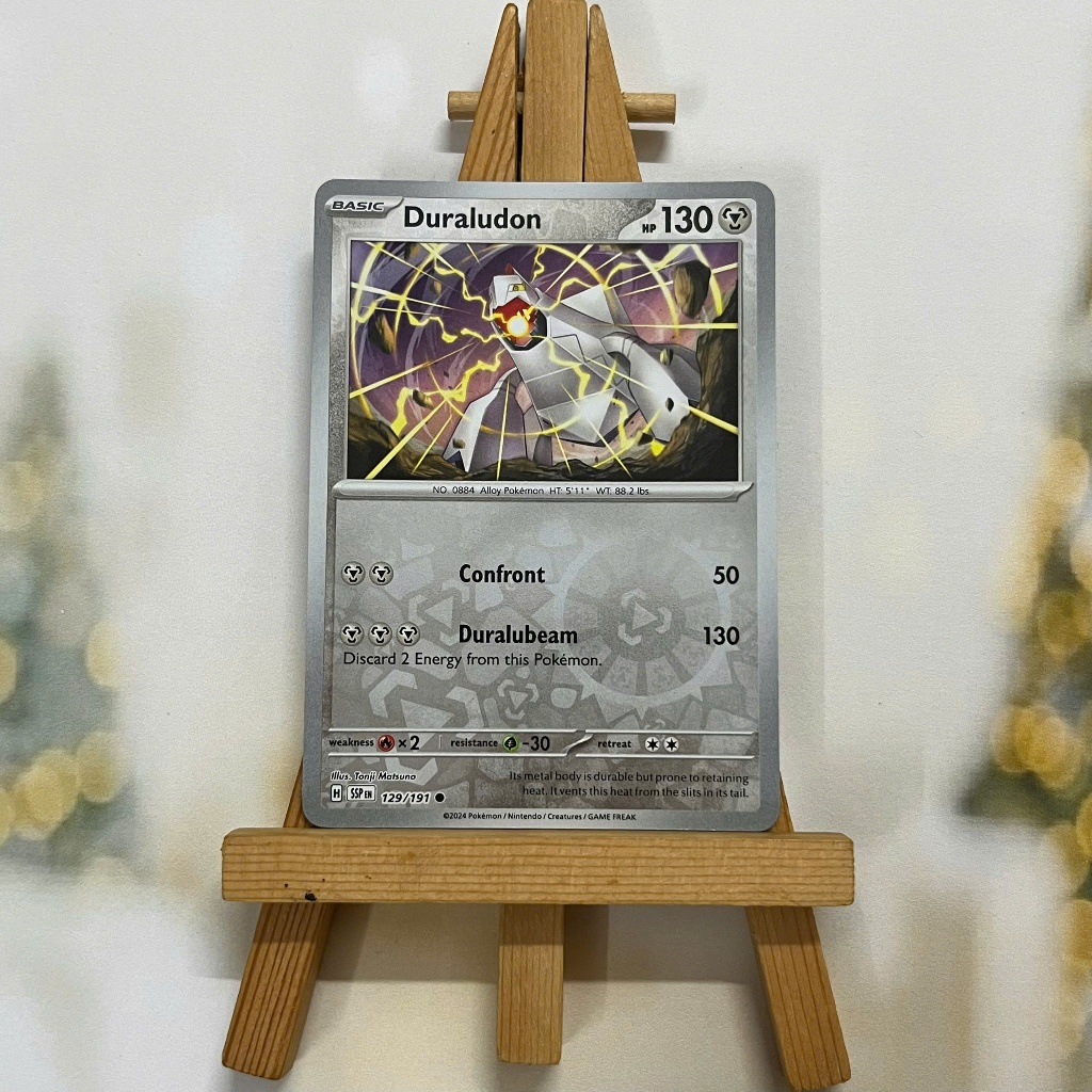 Thẻ hình Pokemon Duraludon 129/191 - Lá bài lẻ Surging Sparks Common Reverse Holo tiếng Anh chính hãng