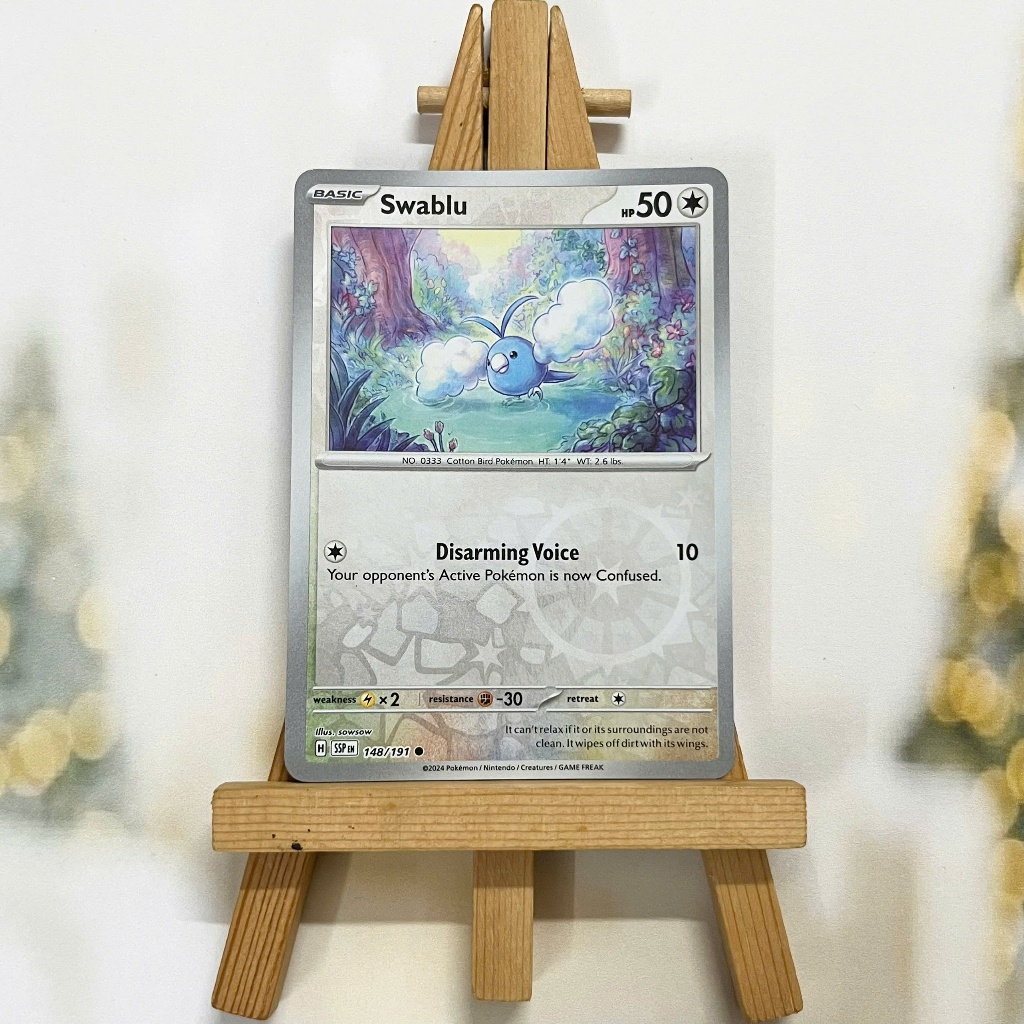 Thẻ hình Pokemon Swablu 148/191 - Lá bài lẻ Surging Sparks Common Reverse Holo tiếng Anh chính hãng
