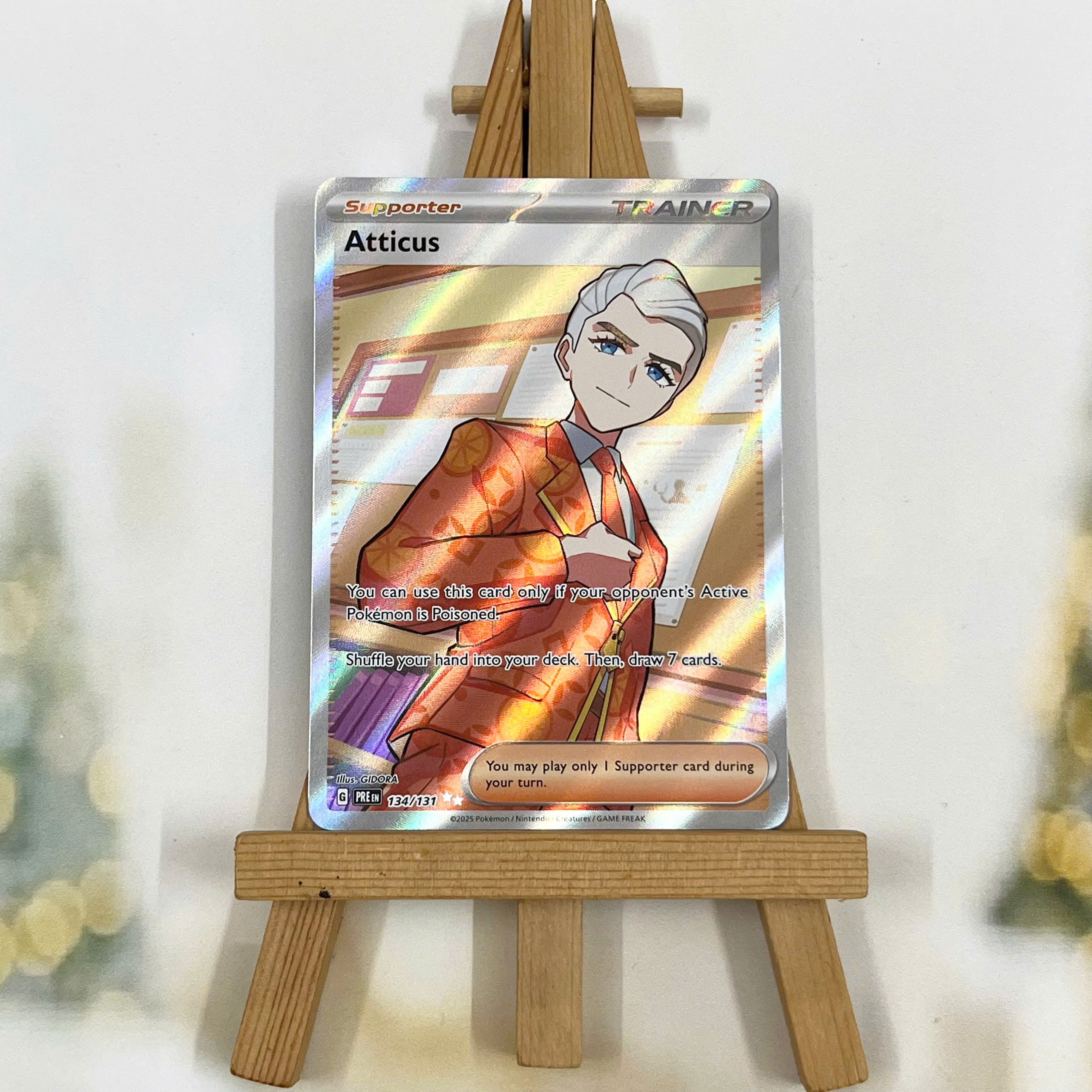 Thẻ hình Pokemon Atticus 134/131 - Lá bài lẻ Prismatic Evolutions Full Art Secret Rare tiếng Anh chính hãng