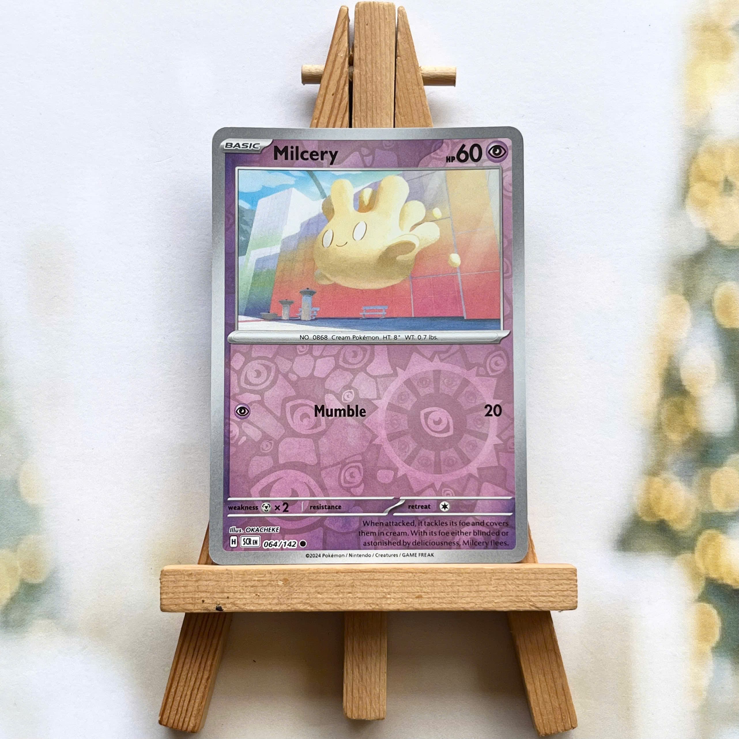 Thẻ hình Pokemon Milcery 064/142 - Lá bài lẻ Stellar Crown Common Reverse Holo tiếng Anh chính hãng