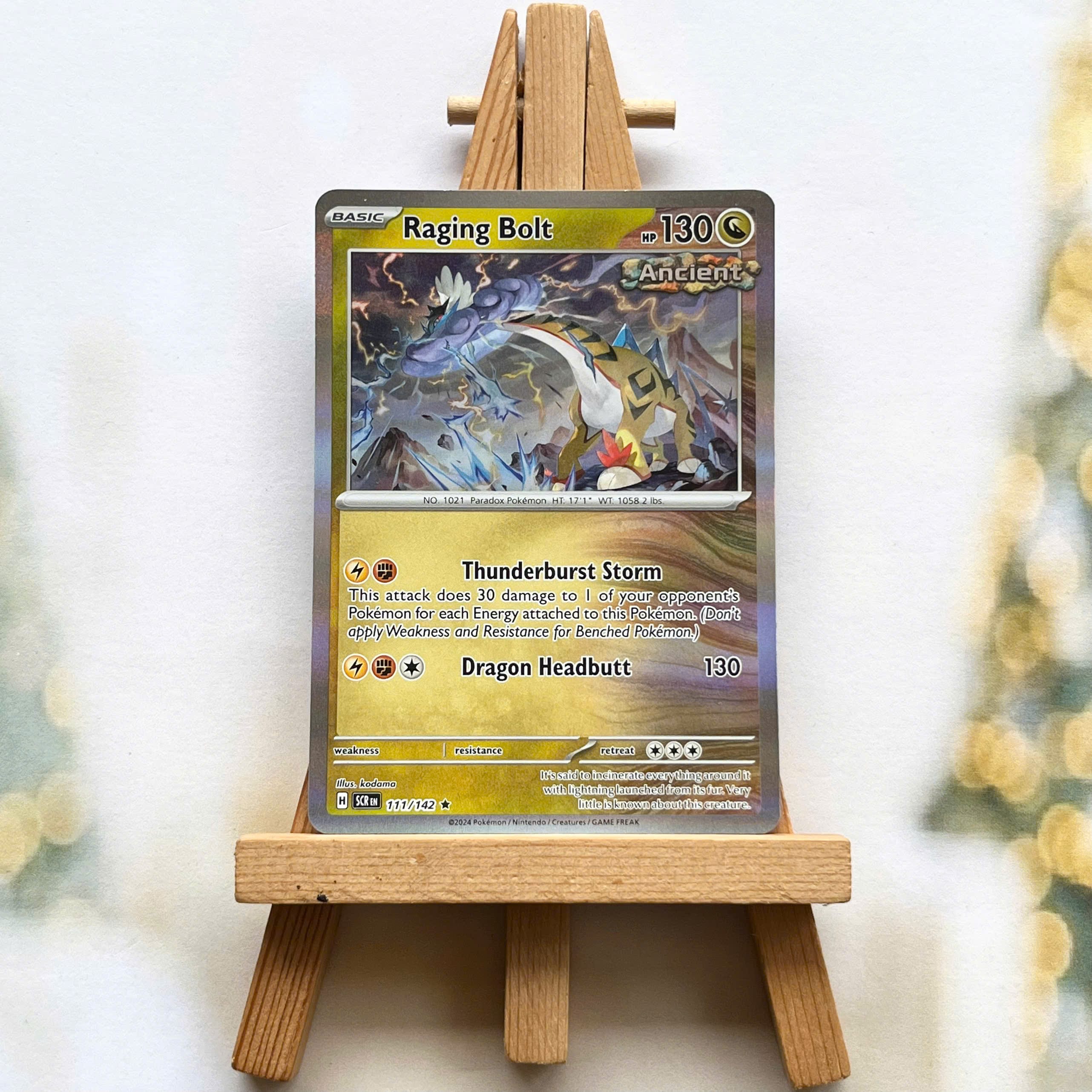 Thẻ hình Pokemon Raging Bolt 111/142 - Lá bài lẻ Stellar Crown Rare Reverse Holo tiếng Anh chính hãng