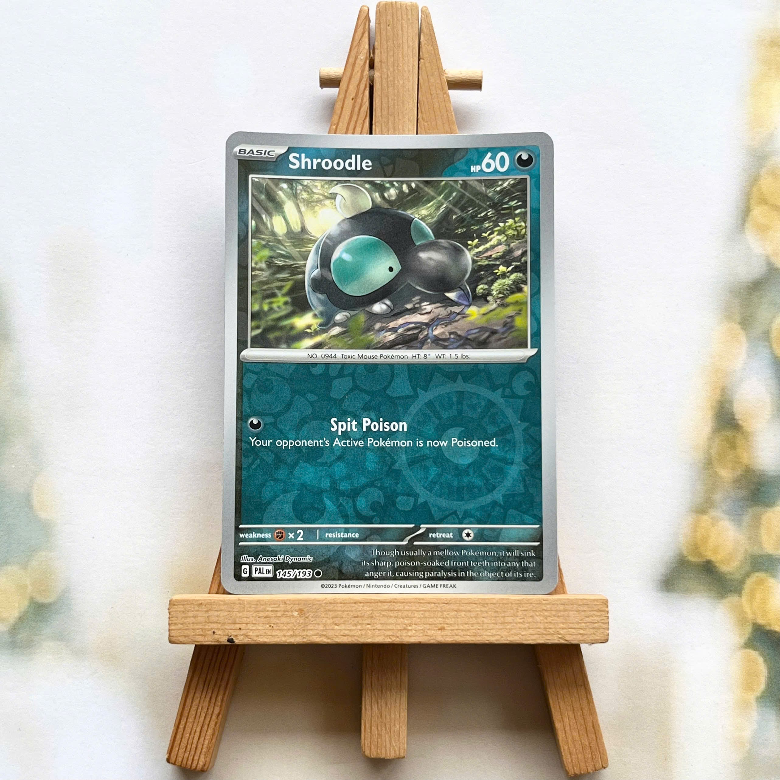 Thẻ hình Pokemon Shroodle 145/193 - Lá bài lẻ Paldea Evolved Common Reverse Holo tiếng Anh chính hãng