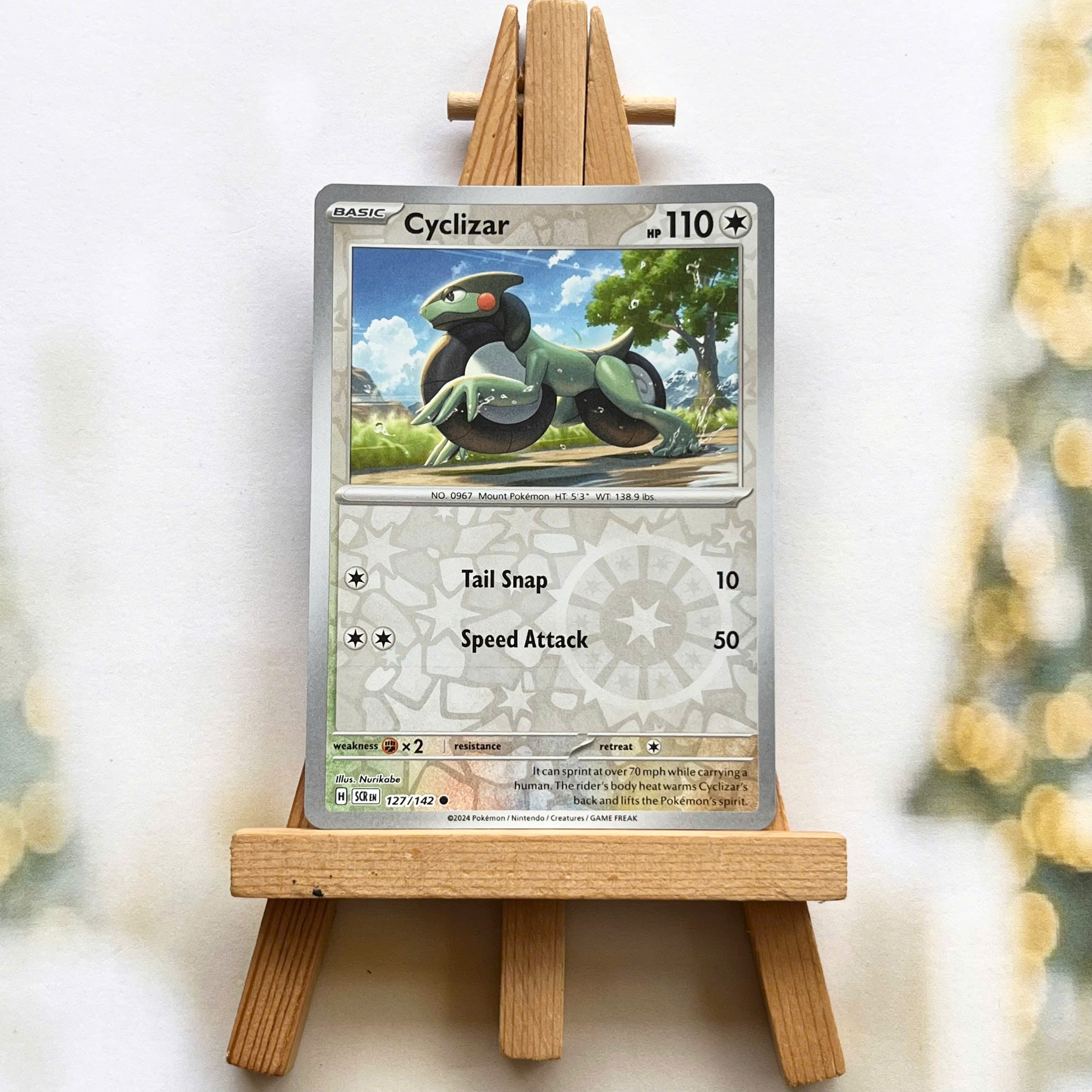 Thẻ hình Pokemon Cyclizar 127/142 - Lá bài lẻ Stellar Crown Common Reverse Holo tiếng Anh chính hãng