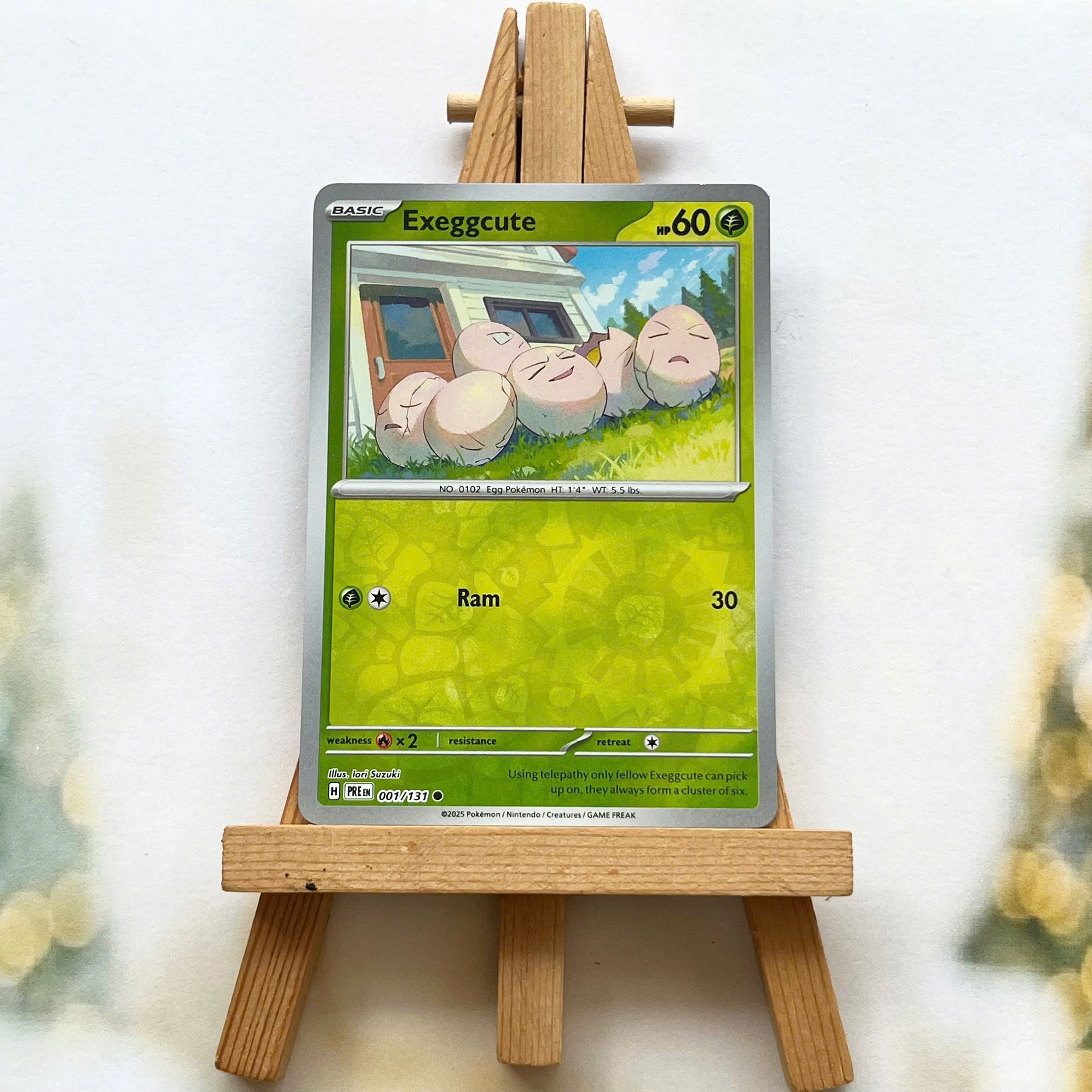 Thẻ hình Pokemon Exeggcute 001/131 - Lá bài lẻ Prismatic Evolutions Common Reverse Holo tiếng Anh chính hãng