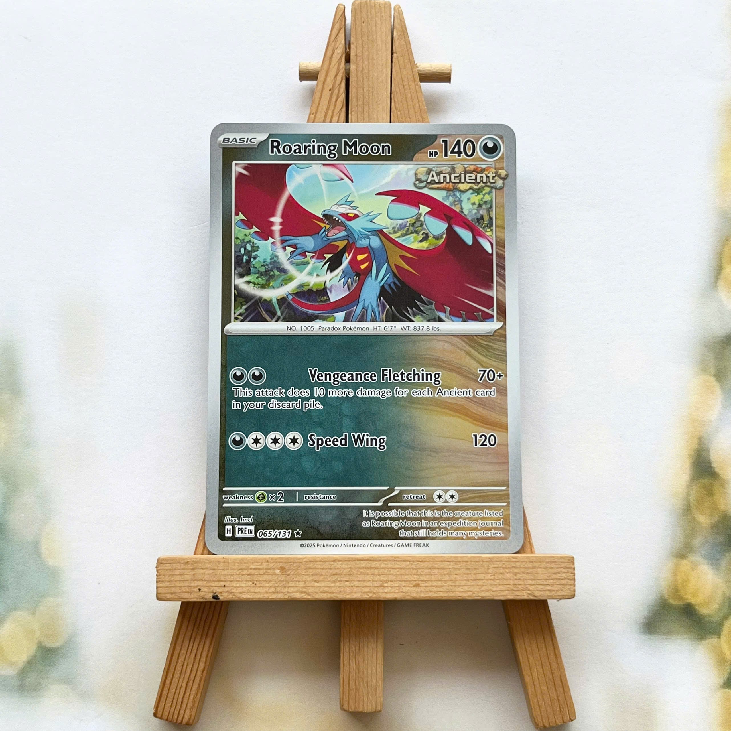 Thẻ hình Pokemon Roaring Moon 065/131 - Lá bài lẻ Prismatic Evolutions Rare Reverse Holo tiếng Anh chính hãng