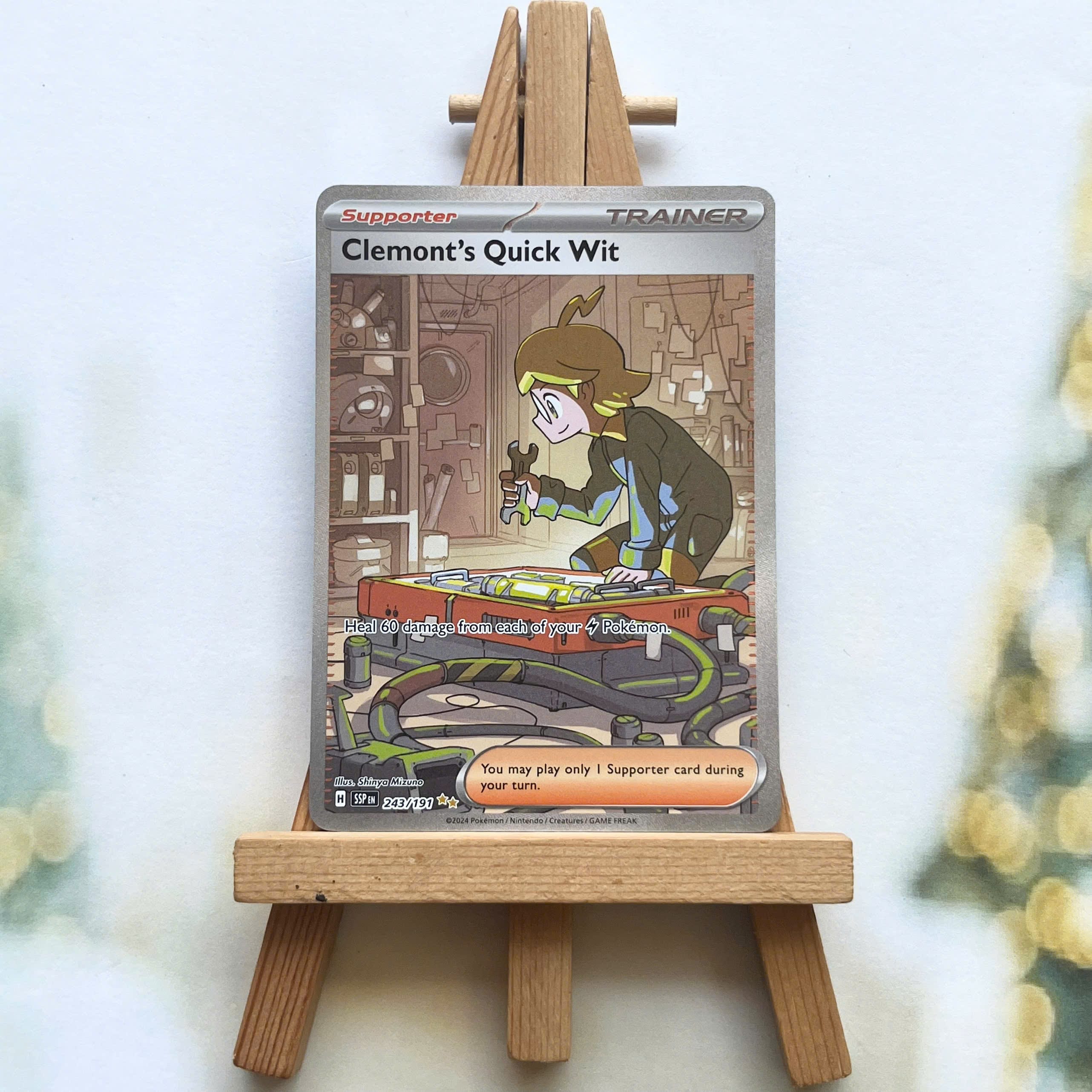 Thẻ hình Pokemon Clemont's Quick Wit 243/191 - Lá bài lẻ Surging Sparks Special Illustration Rare tiếng Anh chính hãng