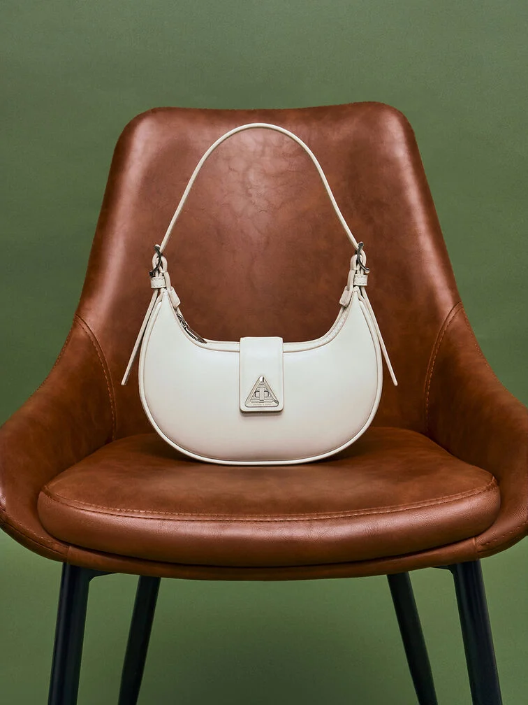 Trice Metallic Accent Belted Curved Shoulder Bag