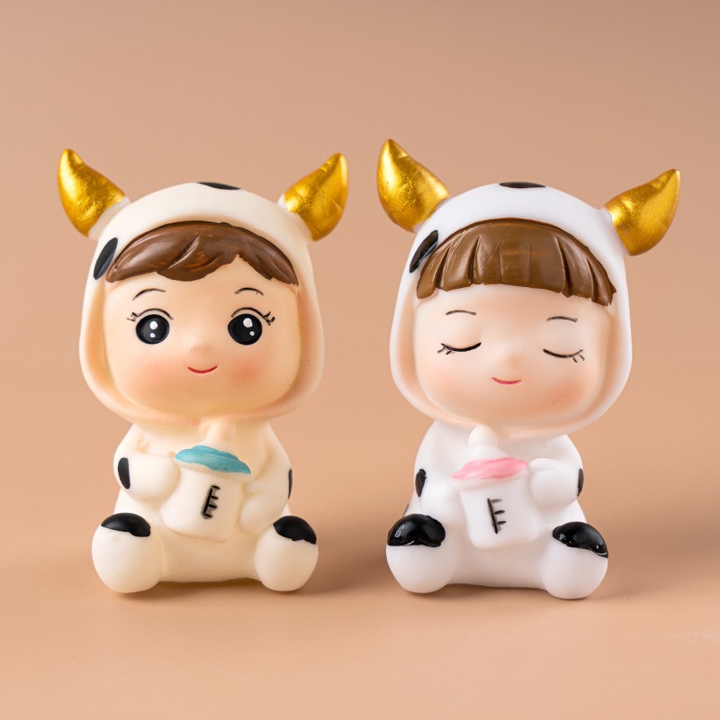 Em bé bò sữa
