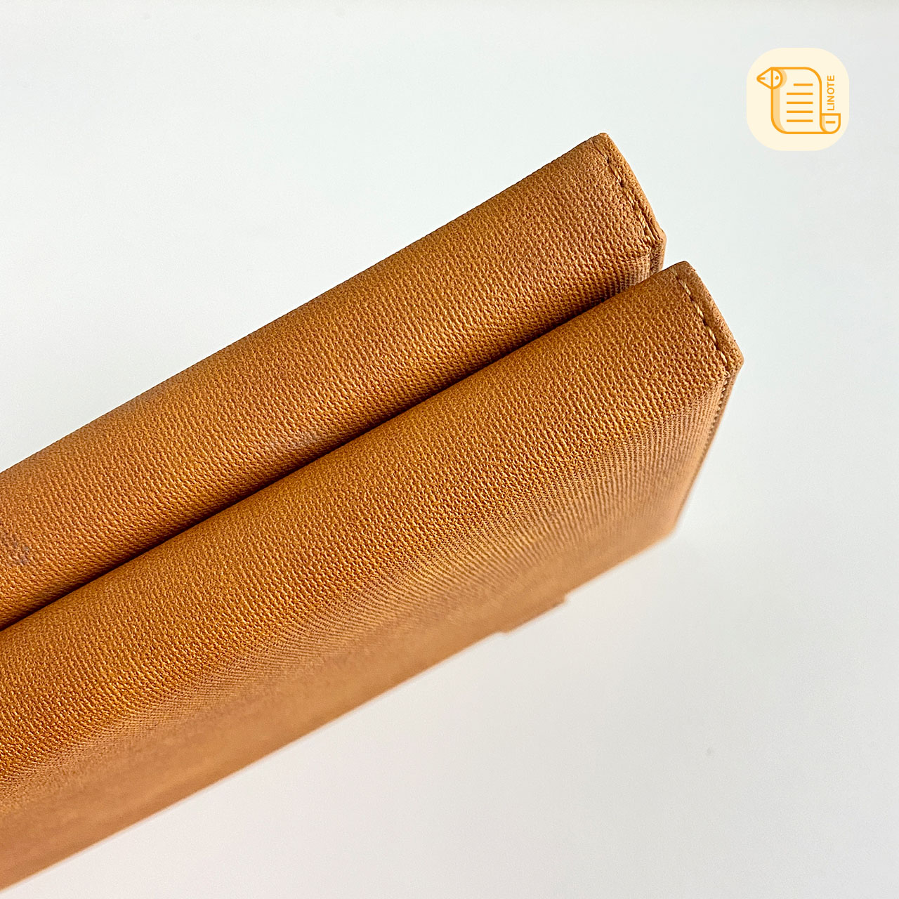 Sổ tay B5 kẻ ngang bìa da vân vải 70gsm, 200 trang, cài bút, để thẻ