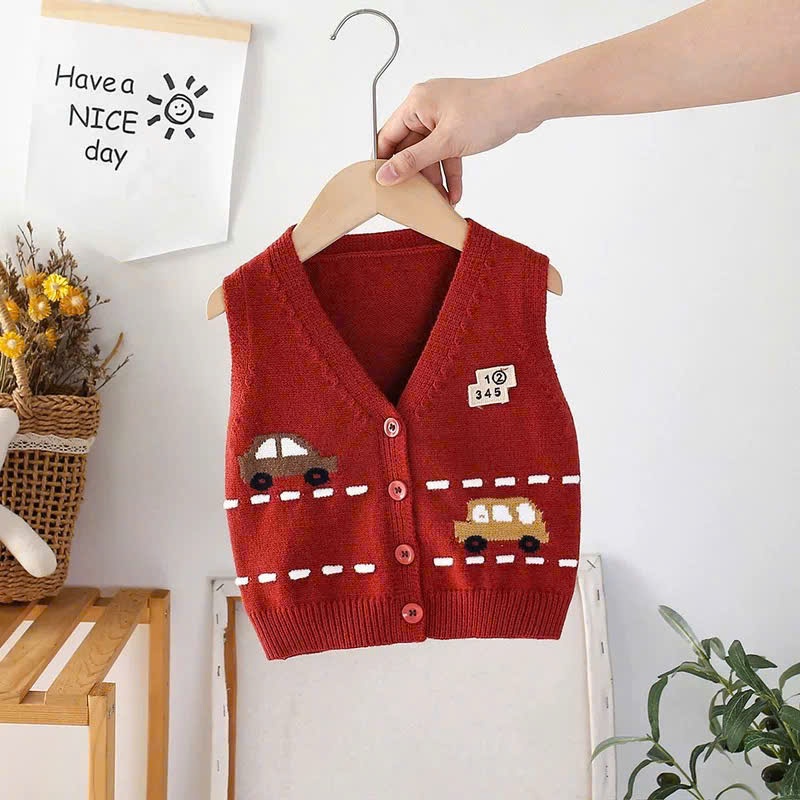 Áo gile len cúc giữa họa tiết ô tô đáng yêu cho bé yêu