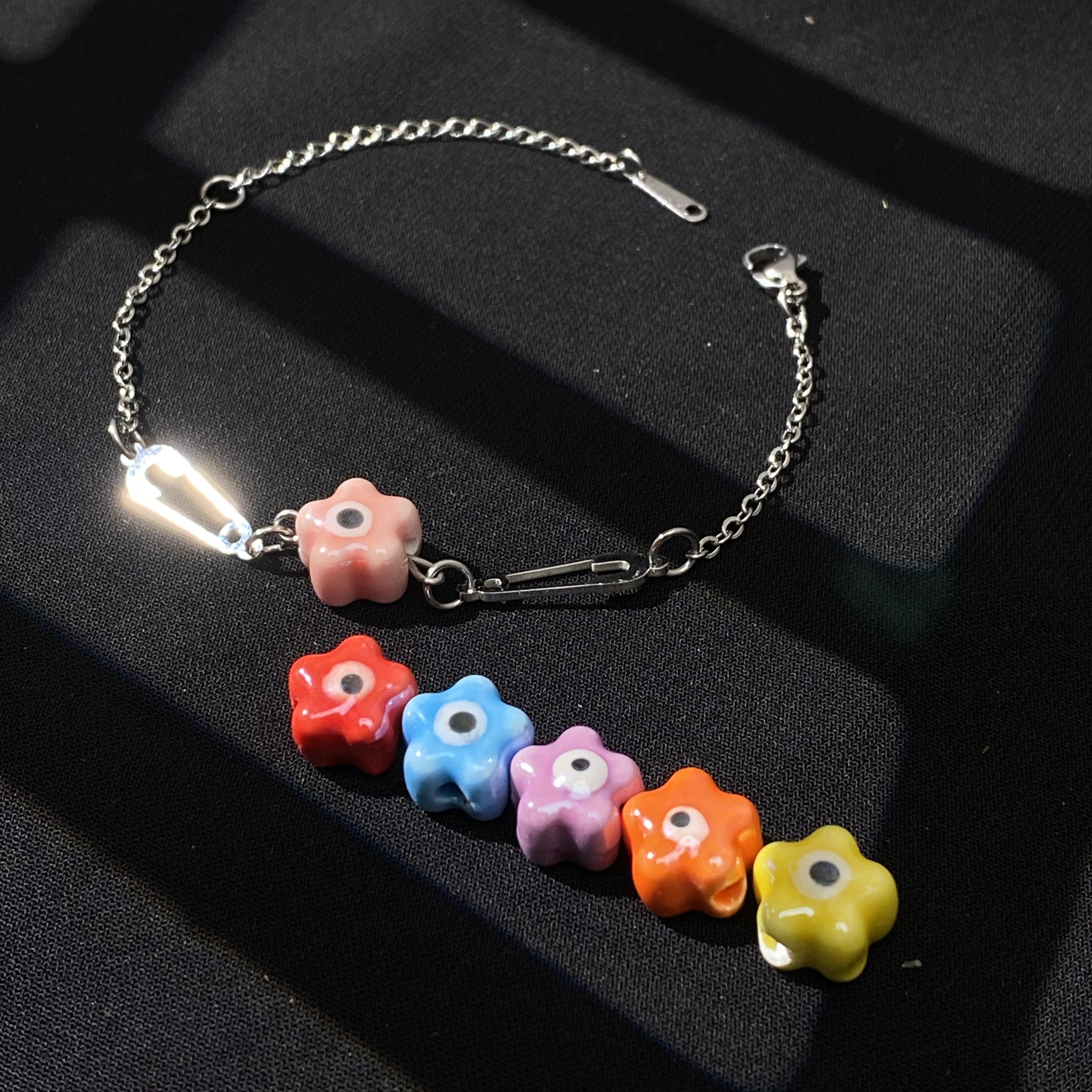 Vòng tay safety Pin x Evil Eye Hoa - Giúp mang lại những điều may mắn trong cuộc sống, mỗi màu một ý nghĩa riêng