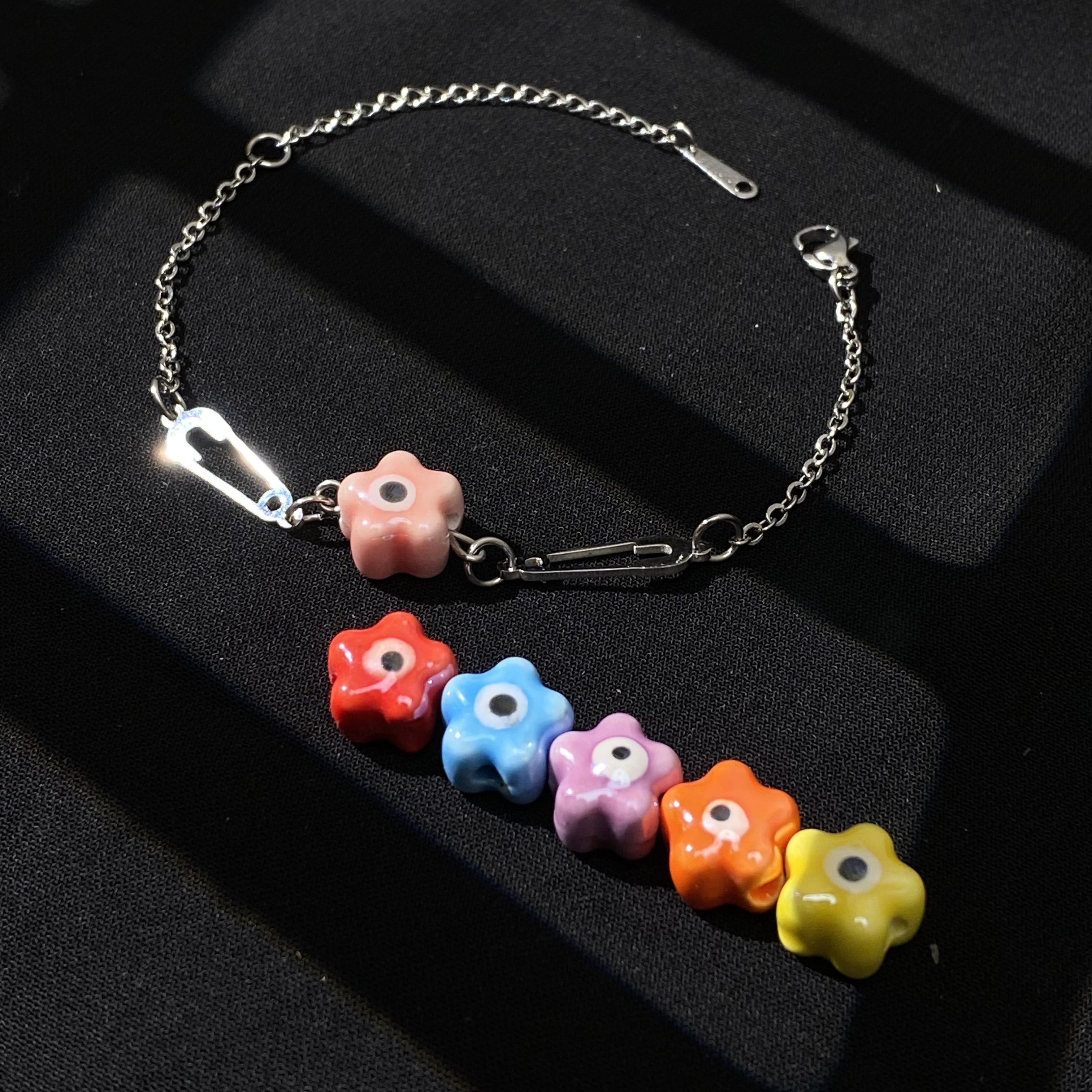 Vòng tay safety Pin x Evil Eye Hoa - Giúp mang lại những điều may mắn trong cuộc sống, mỗi màu một ý nghĩa riêng