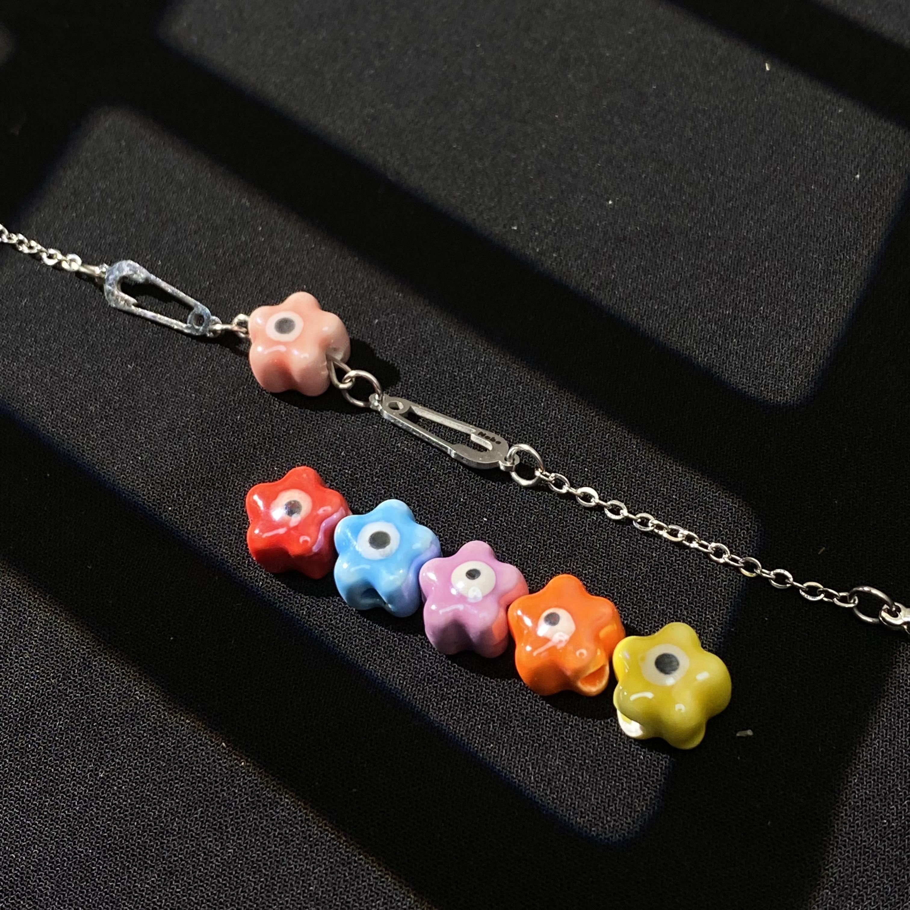 Vòng tay safety Pin x Evil Eye Hoa - Giúp mang lại những điều may mắn trong cuộc sống, mỗi màu một ý nghĩa riêng
