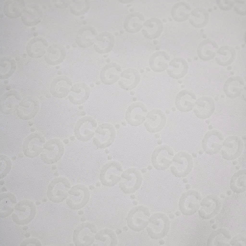 Đồ Bộ Gucci Embossed Monogram