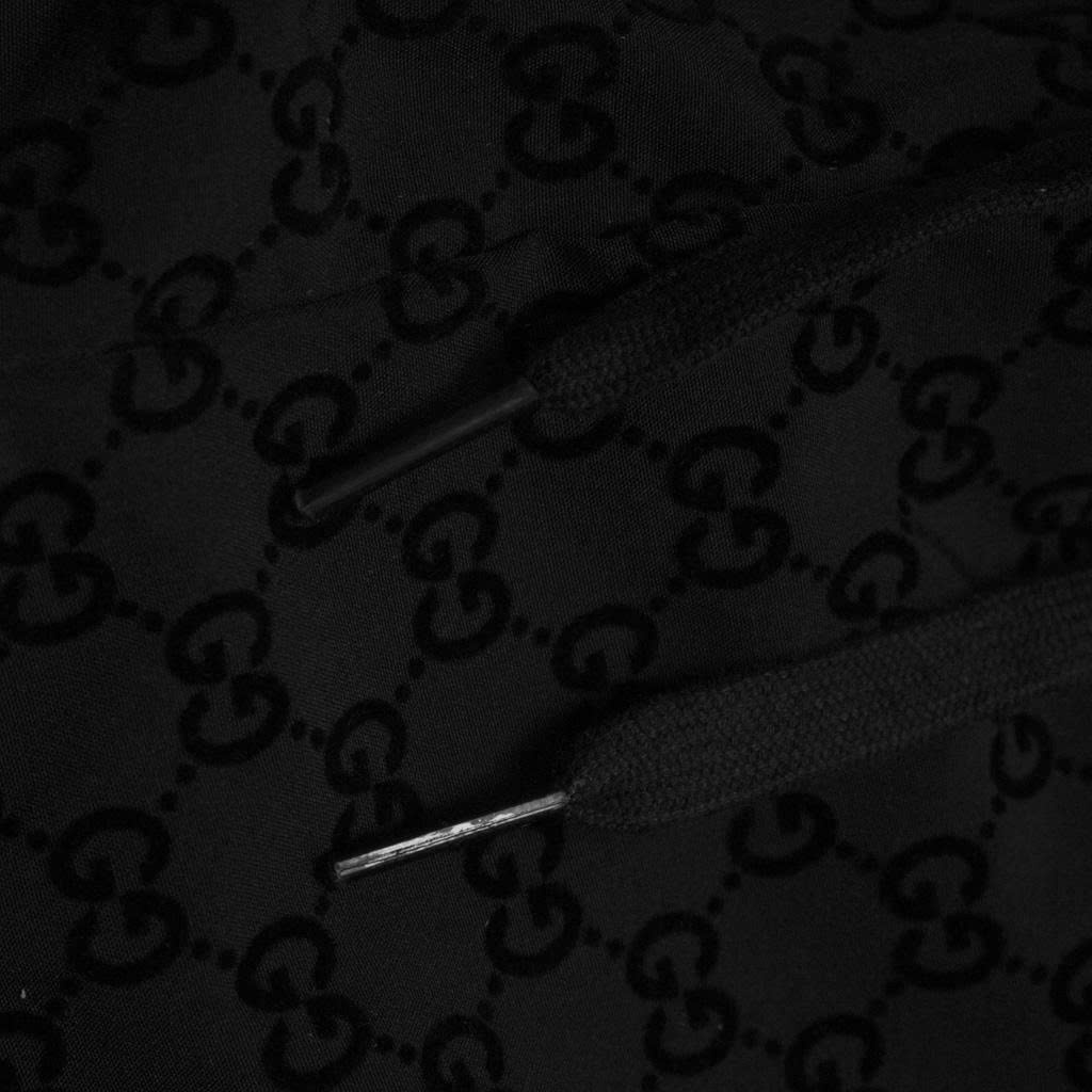 Đồ Bộ Gucci Embossed Monogram