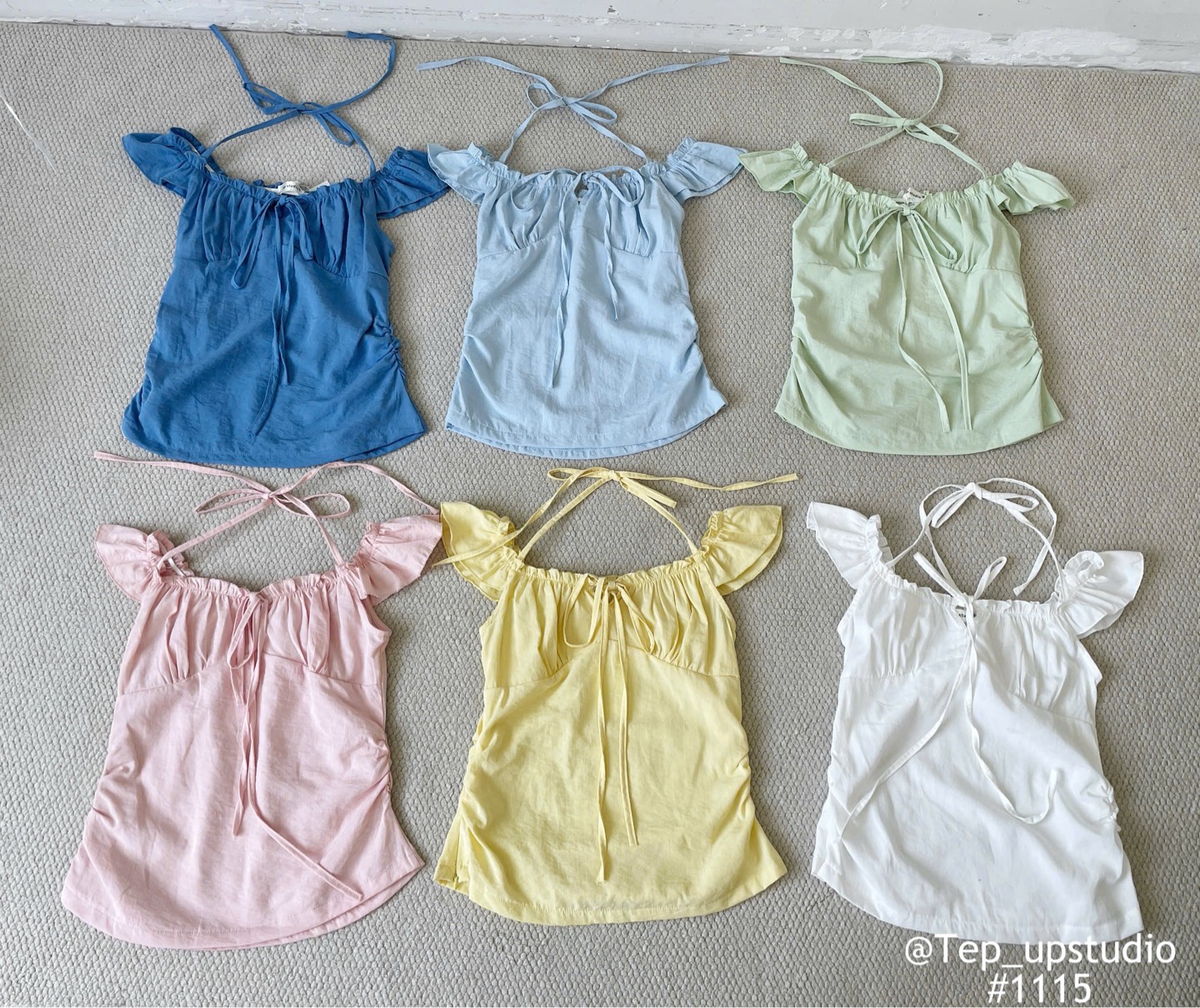Áo kiểu cột dây nơ nhún tay canh tiên