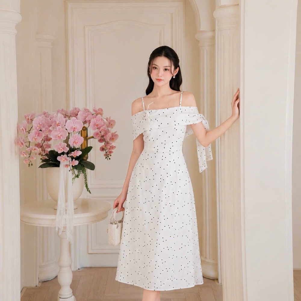 Đầm thiết kế 2 dây trễ vai nơ bên vai chấm bi