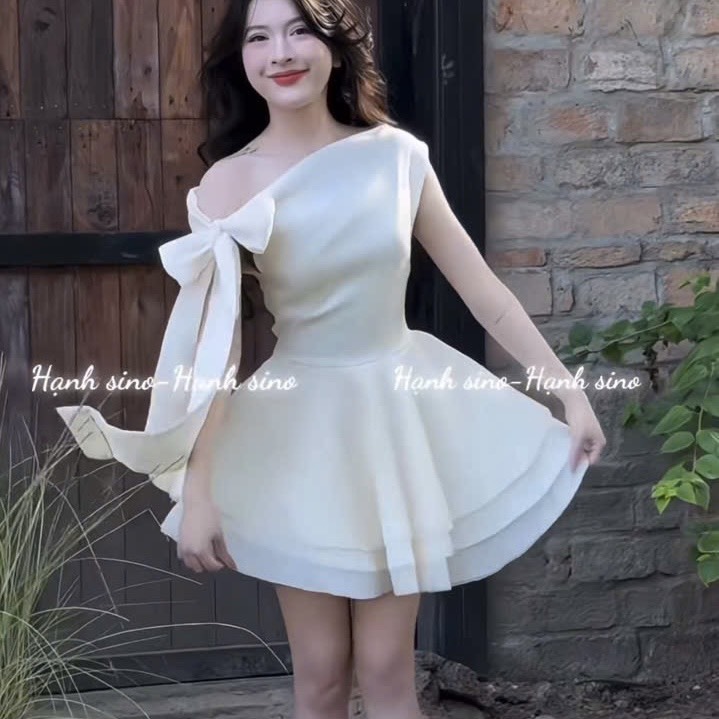 Đầm thiết kế lệch vai thắt nơ vai dáng ngắn