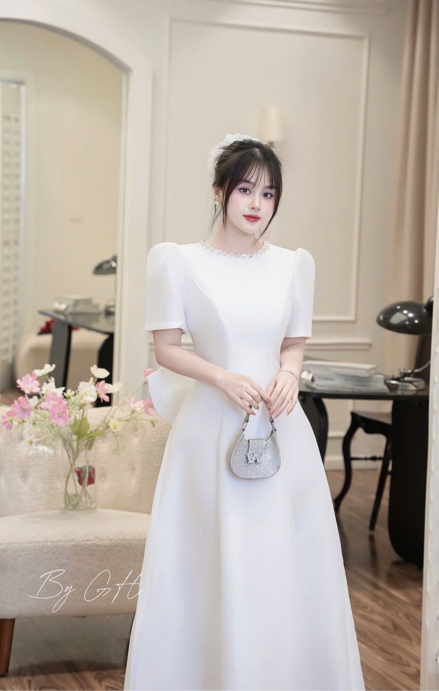 Đầm trắng xoè nơ sau cao cấp H