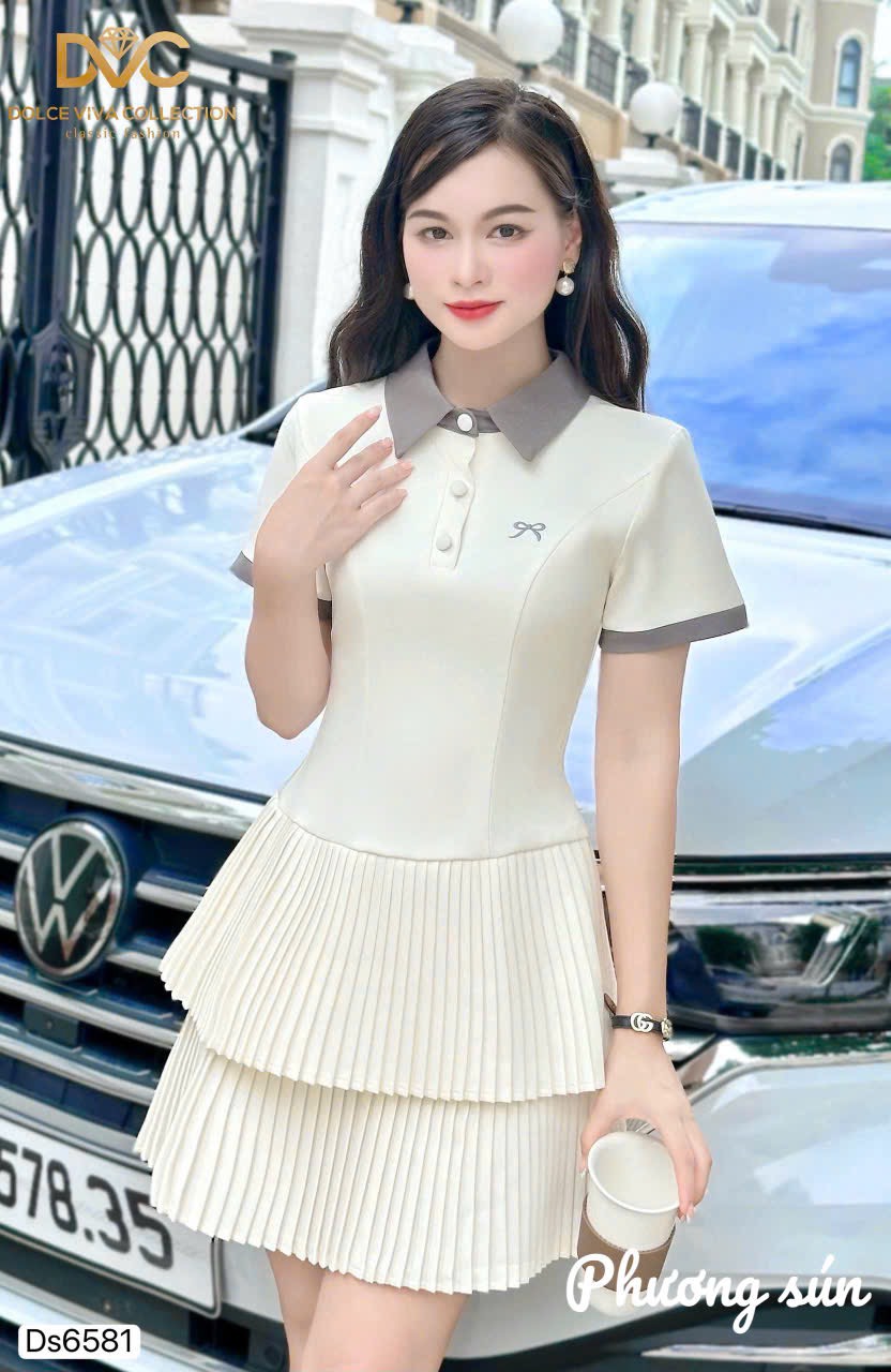 Đầm trắng chân xếp ly thêu nơ phối cổ sen xám